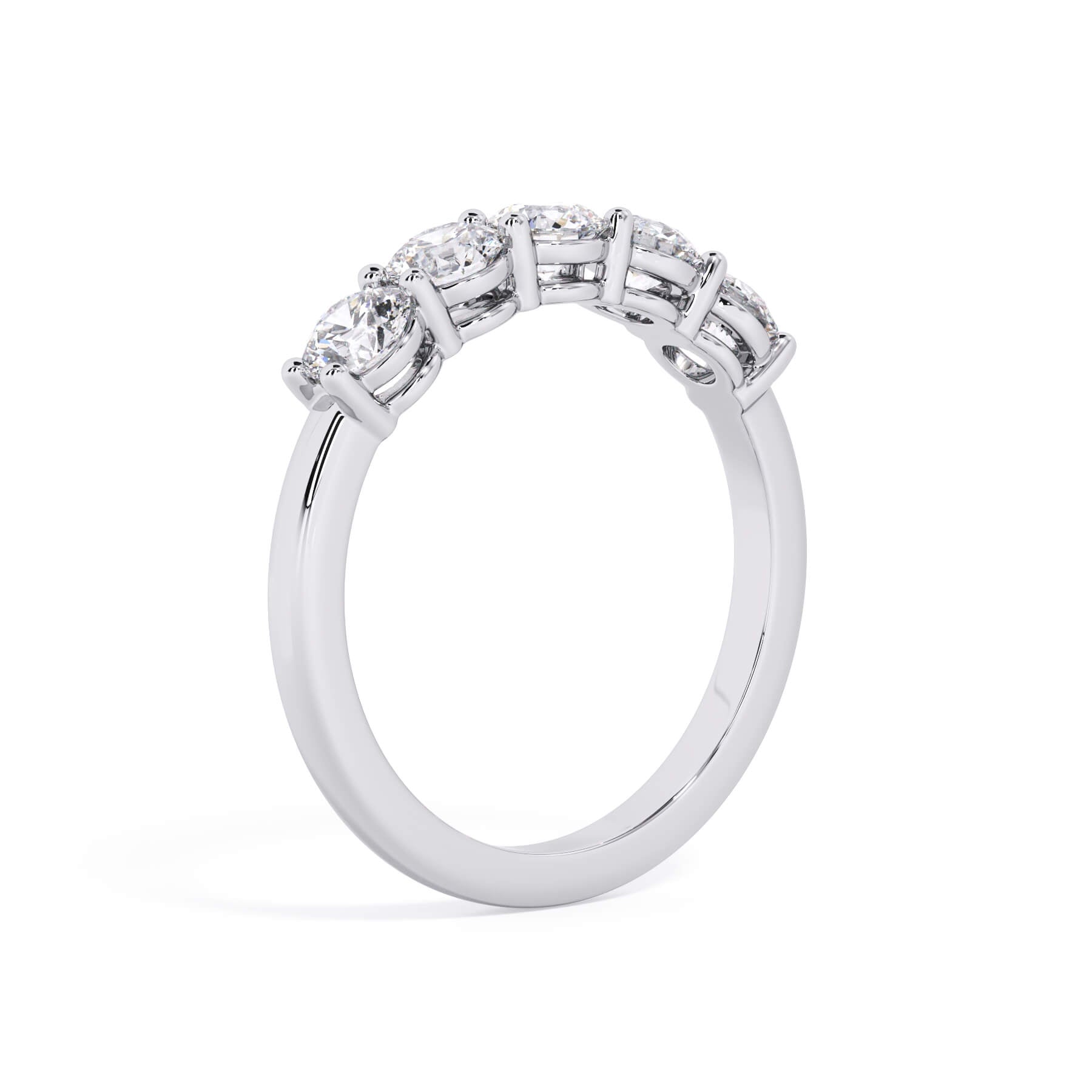 A picture of a five stone diamond wedding ring with round diamonds that are shared prong set in white gold or platinum on a white background with a slightly angled, through the finger view.