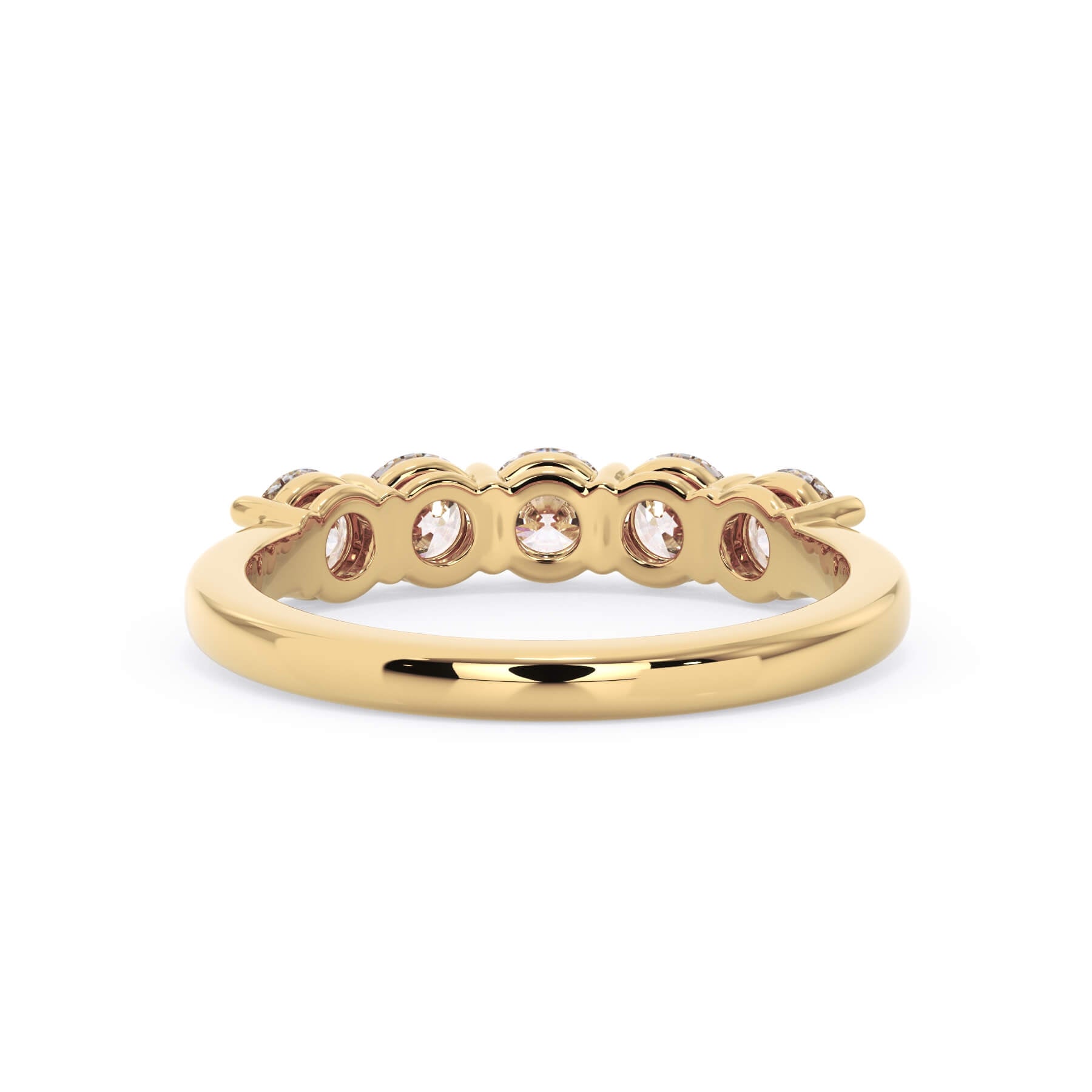 A picture of a five stone diamond wedding ring with round diamonds that are shared prong set in yellow gold on a white background with a view of the underside of the ring.