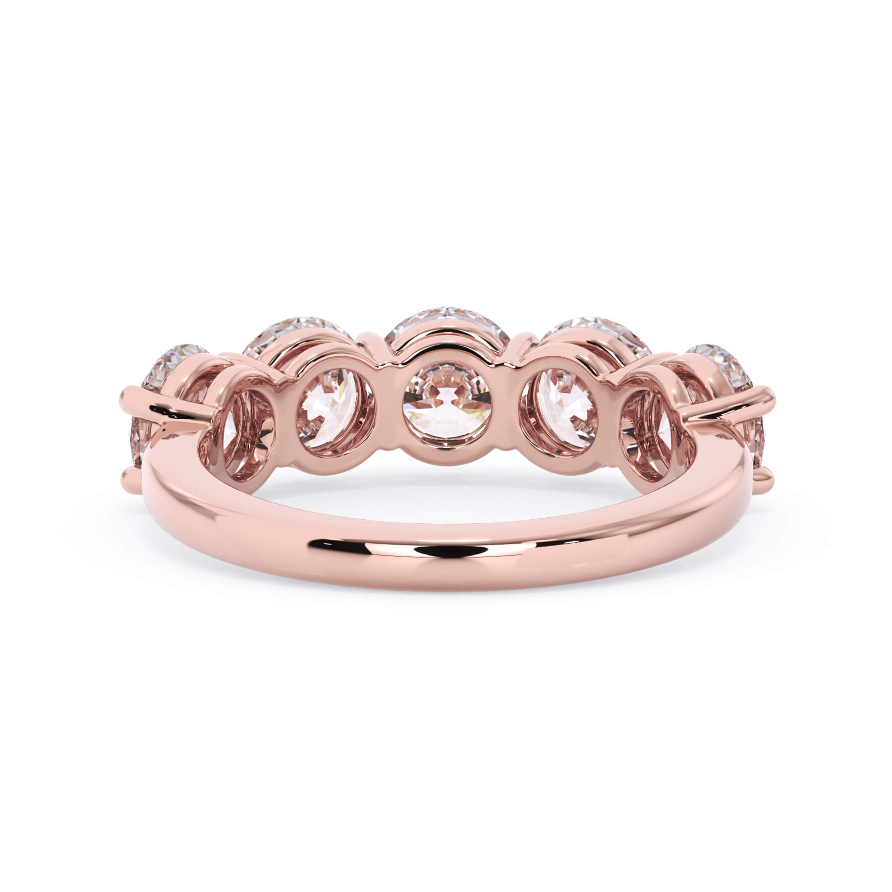 A picture of a five stone diamond wedding ring with round diamonds that are shared prong set in rose gold on a white background with a view of the underside of the ring.