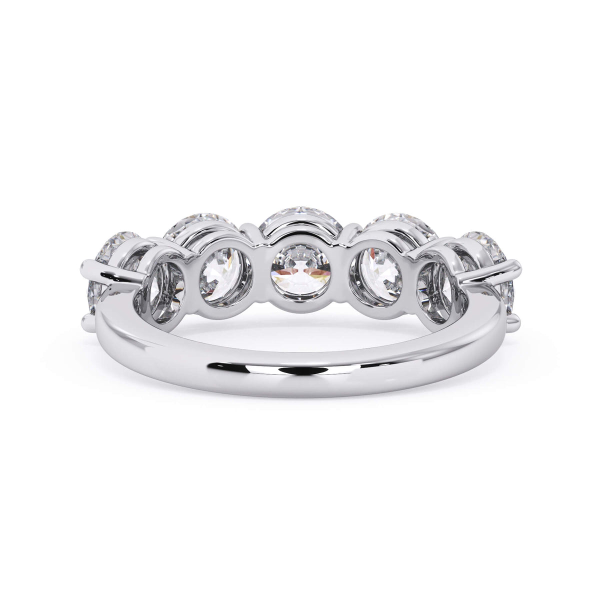 A picture of a five stone diamond wedding ring with round diamonds that are shared prong set in white gold or platinum on a white background with a view of the underside of the ring.