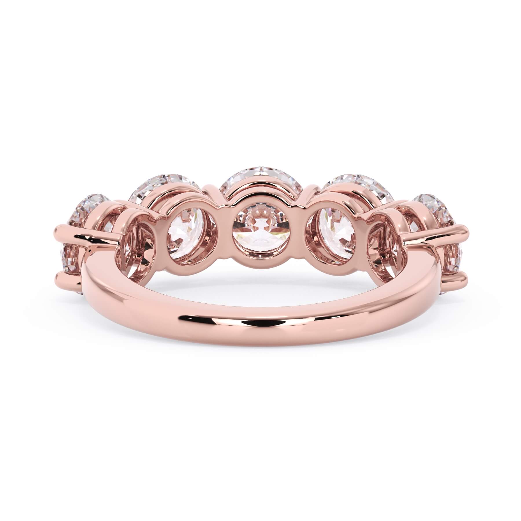 A picture of a five stone diamond wedding ring with round diamonds that are shared prong set in rose gold on a white background with a view of the underside of the ring.