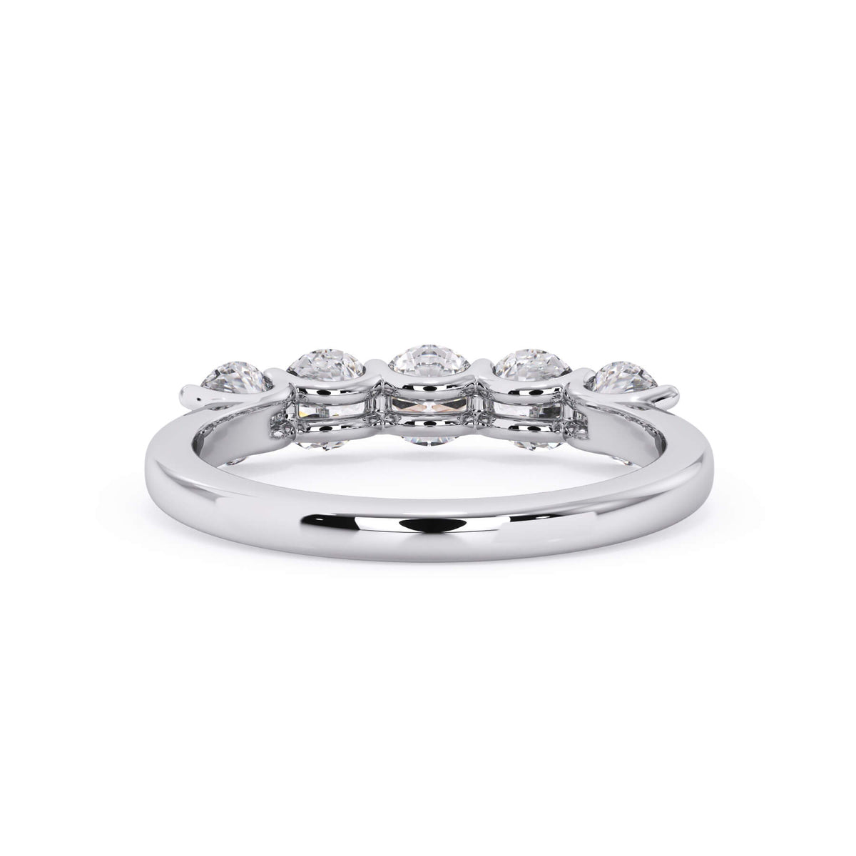 A picture of a five stone diamond wedding ring with round diamonds that are u prong set in white gold or platinum on a white background with a view of the underside of the ring.
