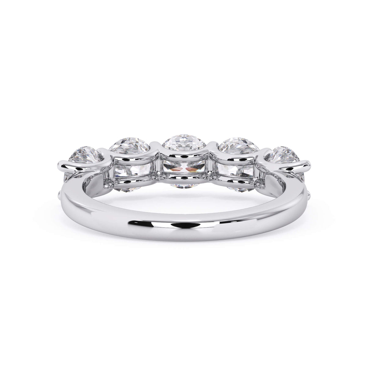 A picture of a five stone diamond wedding ring with round diamonds that are u prong set in white gold or platinum on a white background with a view of the underside of the ring.