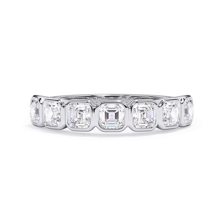 A picture of a seven stone diamond wedding ring with asscher cut diamonds that are bezel set in white gold or platinum on a white background with the ring facing forward, lying down.
