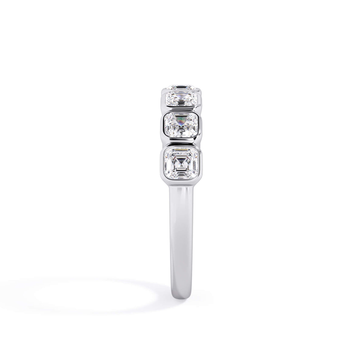 A picture of a seven stone diamond wedding ring with asscher cut diamonds that are bezel set in white gold or platinum on a white background with a side profile view.