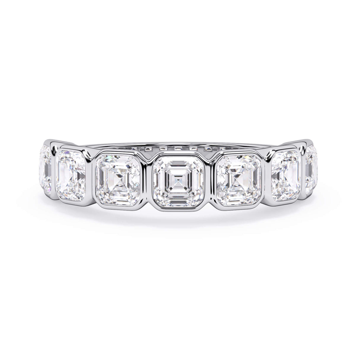 A picture of a seven stone diamond wedding ring with asscher cut diamonds that are bezel set in white gold or platinum on a white background with the ring facing forward, lying down.