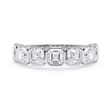 A picture of a seven stone diamond wedding ring with asscher cut diamonds that are bezel set in white gold or platinum on a white background with the ring facing forward, lying down.
