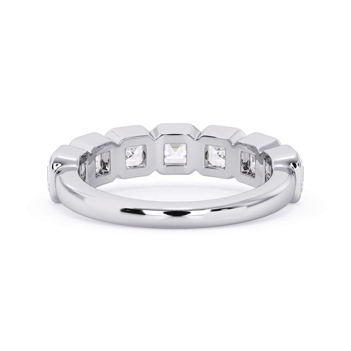 A picture of a seven stone diamond wedding ring with asscher cut diamonds that are bezel set in white gold or platinum on a white background with a view of the underside of the ring.