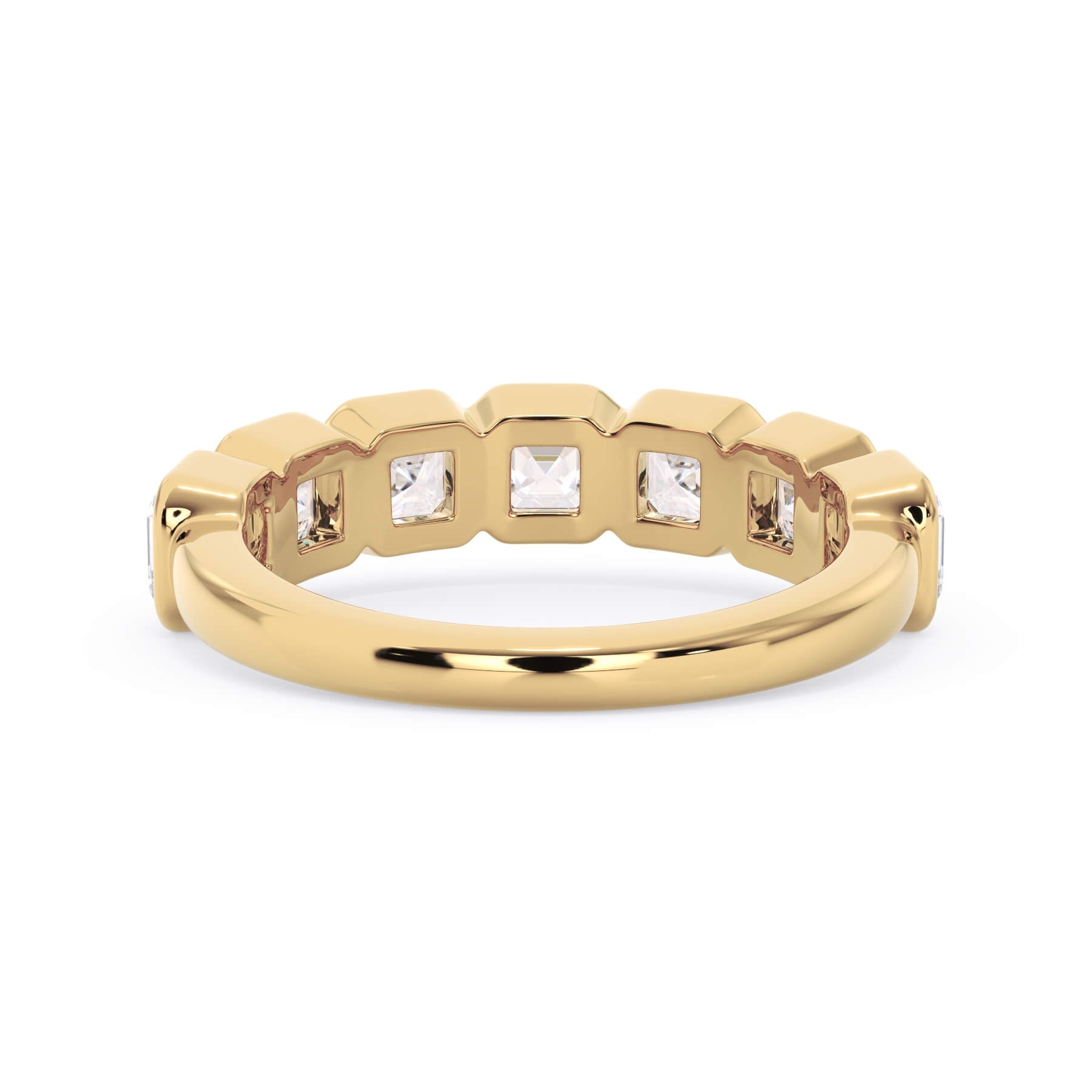 A picture of a seven stone diamond wedding ring with asscher cut diamonds that are bezel set in yellow gold on a white background with a view of the underside of the ring.