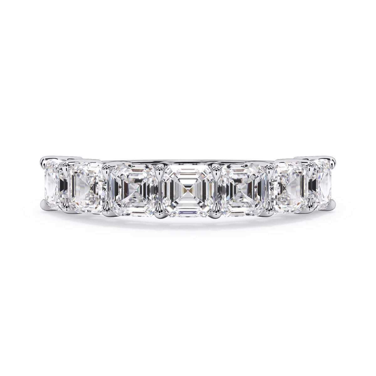 A picture of a seven stone diamond wedding ring with asscher cut diamonds that are shared prong set in white gold or platinum on a white background with the ring facing forward, lying down.