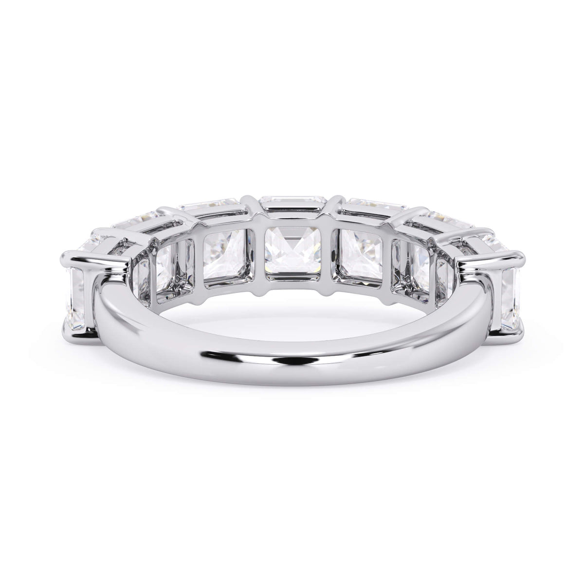 A picture of a seven stone diamond wedding ring with asscher cut diamonds that are shared prong set in white gold or platinum on a white background with a view of the underside of the ring.