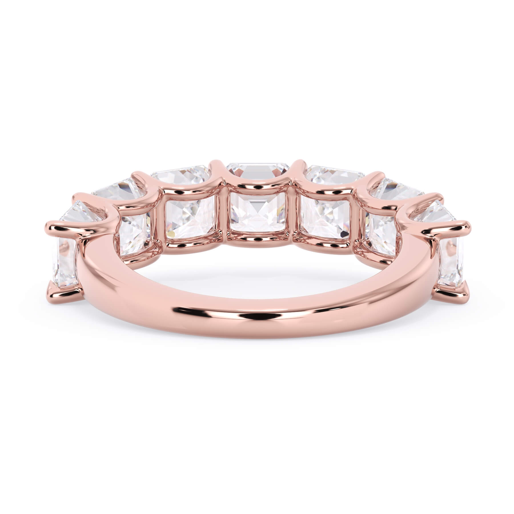 A picture of a seven stone diamond wedding ring with asscher cut diamonds that are U prong set in rose gold on a white background with a view of the underside of the ring.