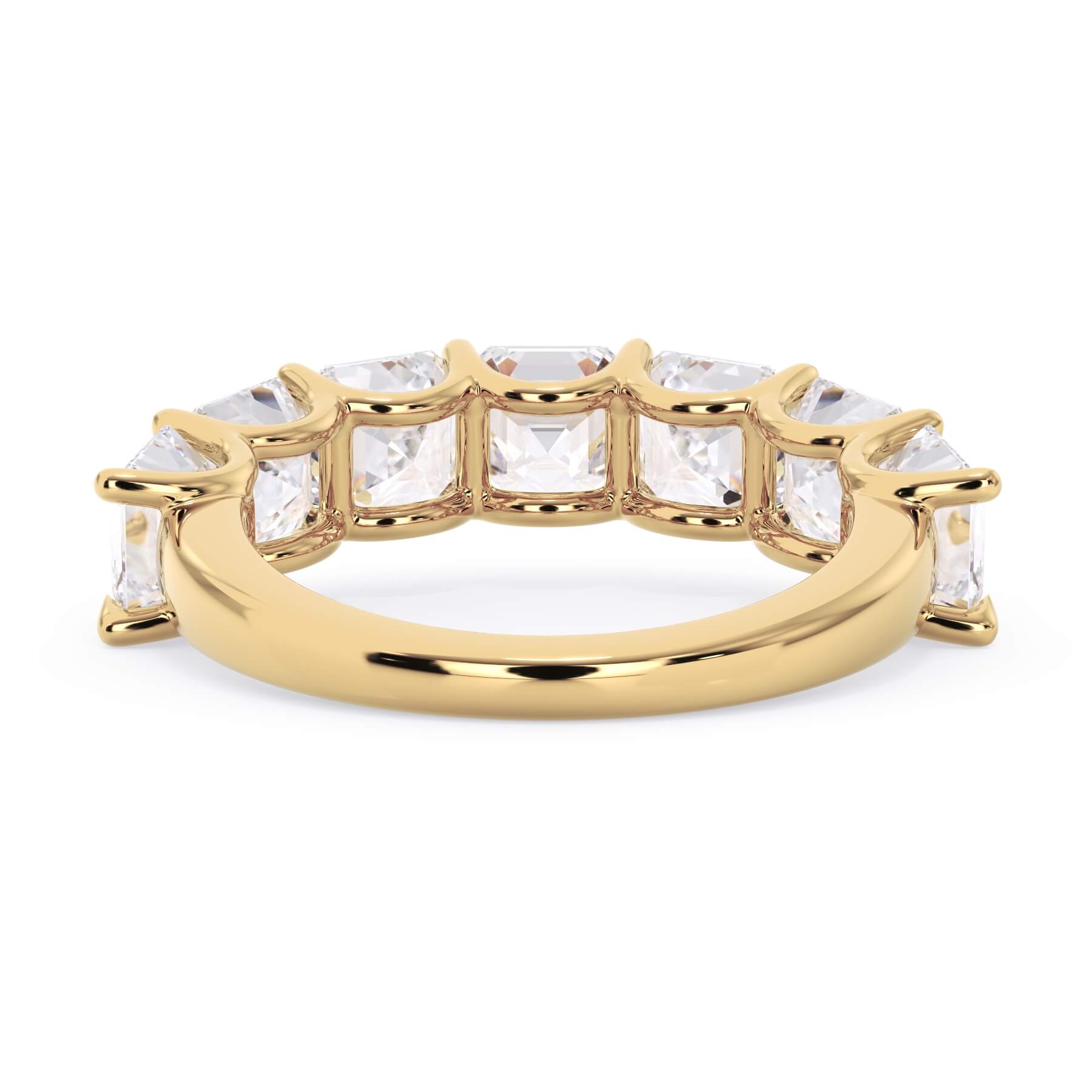 A picture of a seven stone diamond wedding ring with asscher cut diamonds that are U prong set in yellow gold on a white background with a view of the underside of the ring.