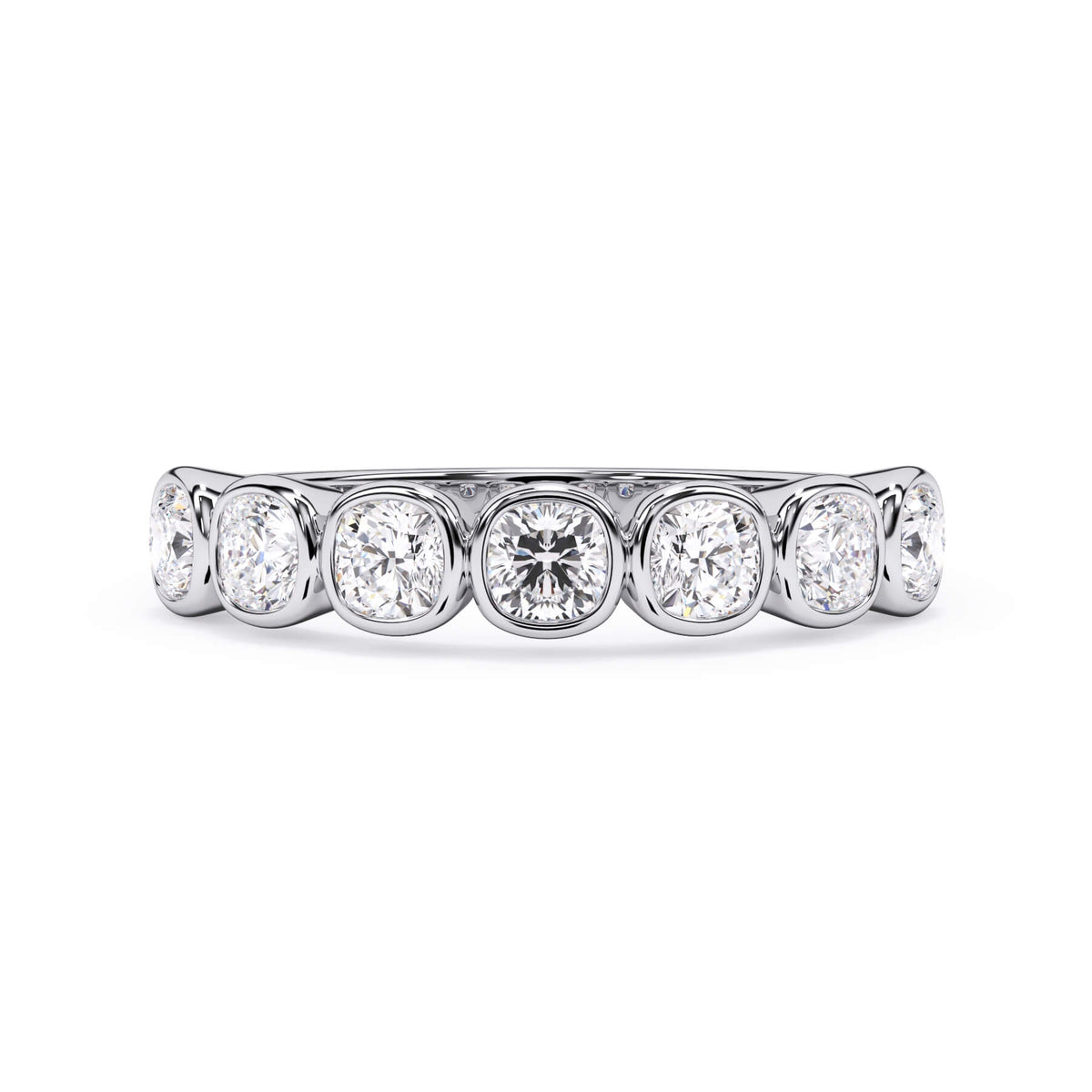 A picture of a seven stone diamond wedding ring with cushion cut diamonds that are bezel set in white gold or platinum on a white background with the ring facing forward, lying down.