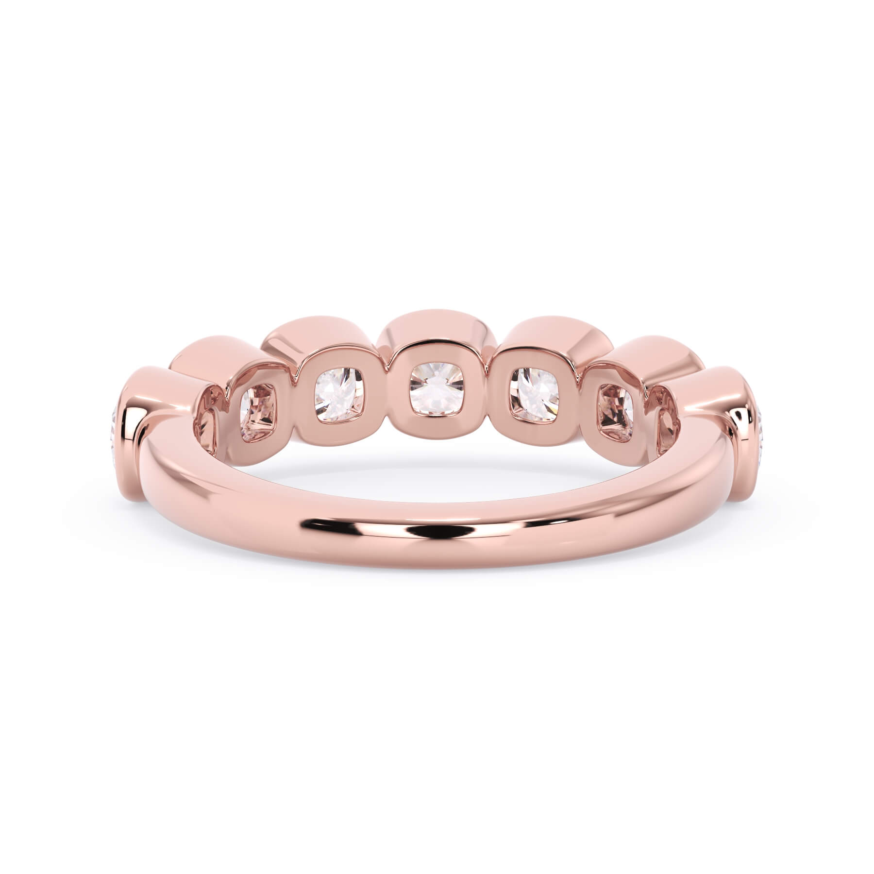 A picture of a seven stone diamond wedding ring with cushion cut diamonds that are bezel set in rose gold on a white background with the ring facing forward, lying down.