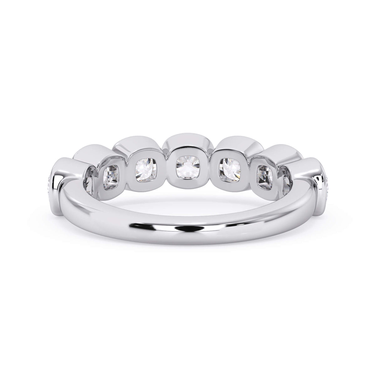 A picture of a seven stone diamond wedding ring with cushion cut diamonds that are bezel set in white gold or platinum on a white background with the ring facing forward, lying down.