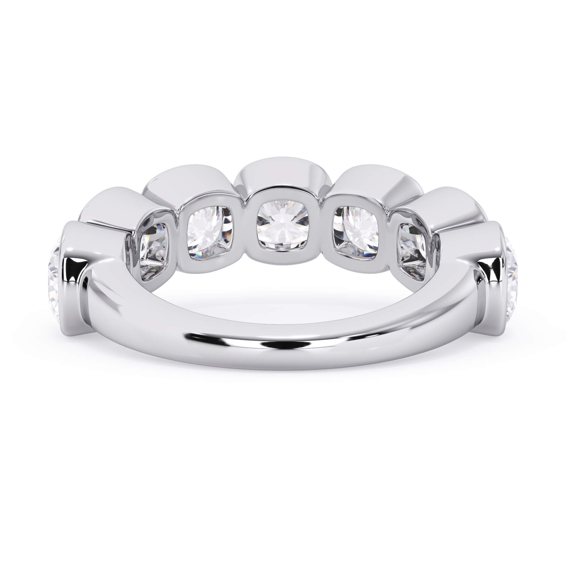 A picture of a seven stone diamond wedding ring with cushion cut diamonds that are bezel set in white gold or platinum on a white background with a view of the underside of the ring.