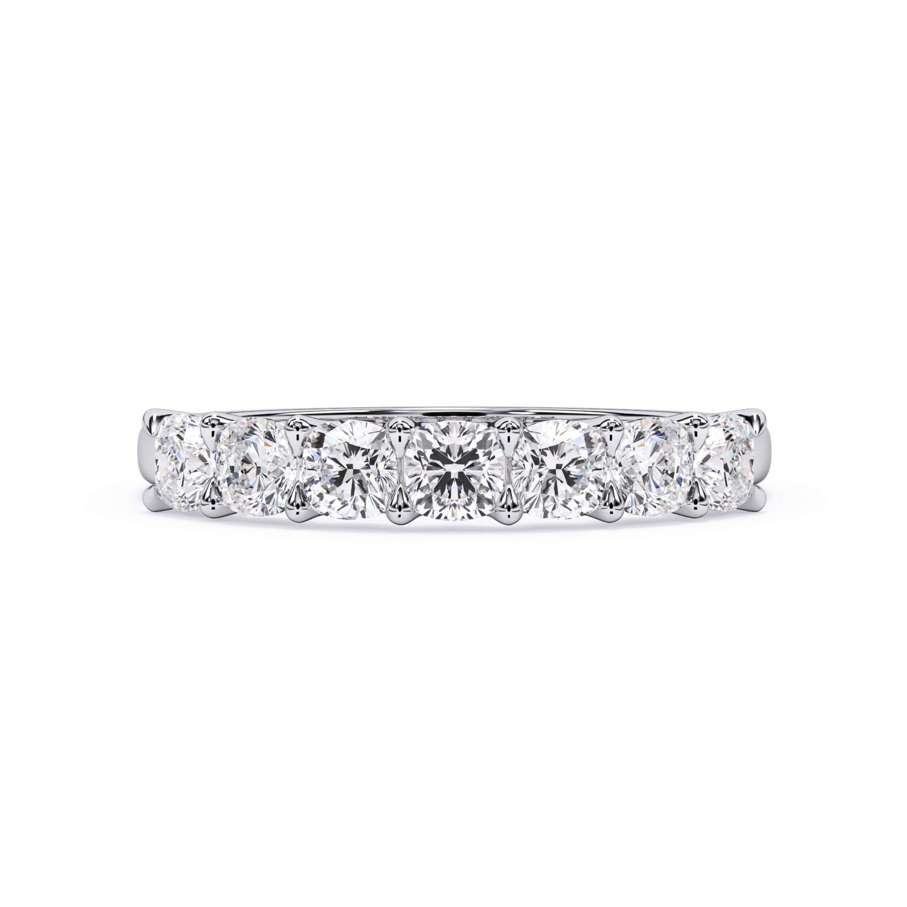 A picture of a seven stone diamond wedding ring with cushion cut diamonds that are U prong set in white gold or platinum on a white background with the ring facing forward, lying down.