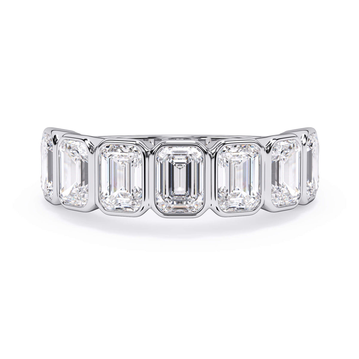 A picture of a seven stone diamond wedding ring with emerald cut diamonds that are bezel set in white gold or platinum on a white background with the ring facing forward, lying down.