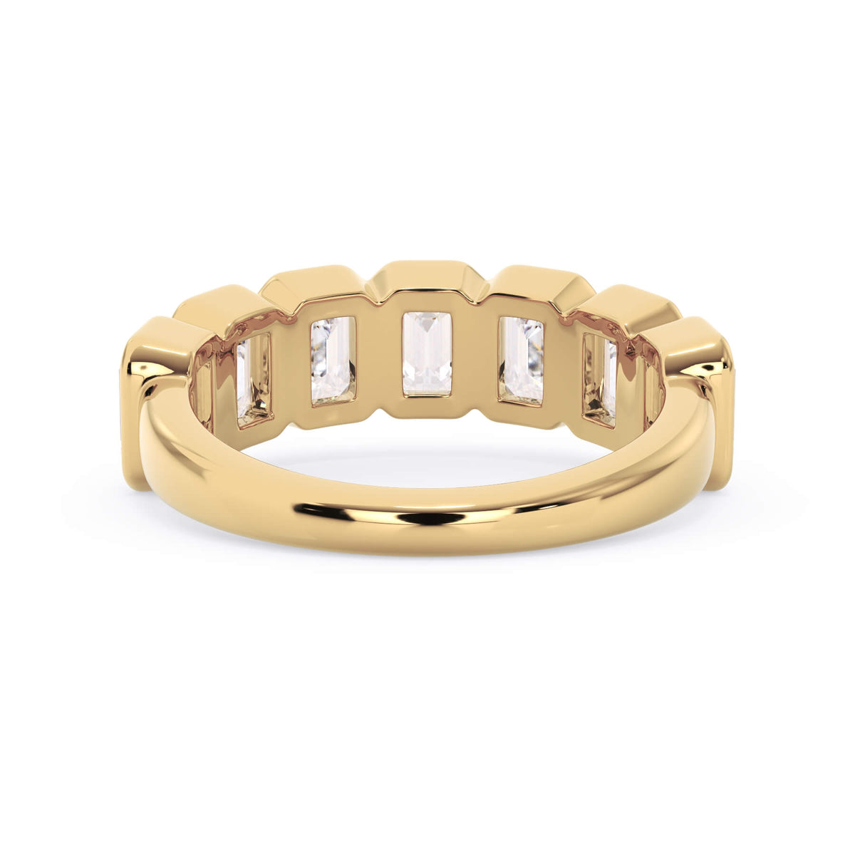 A picture of a seven stone diamond wedding ring with emerald cut diamonds that are bezel set in yellow gold on a white background with a view of the underside of the ring.