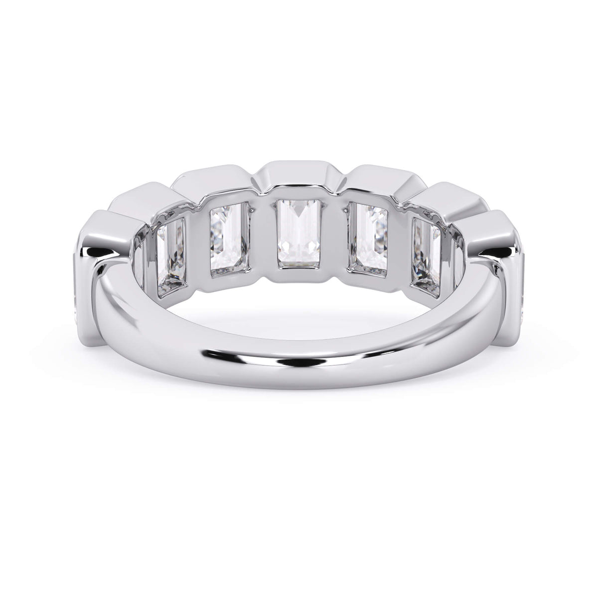 A picture of a seven stone diamond wedding ring with emerald cut diamonds that are bezel set in white gold or platinum on a white background with a view of the underside of the ring.