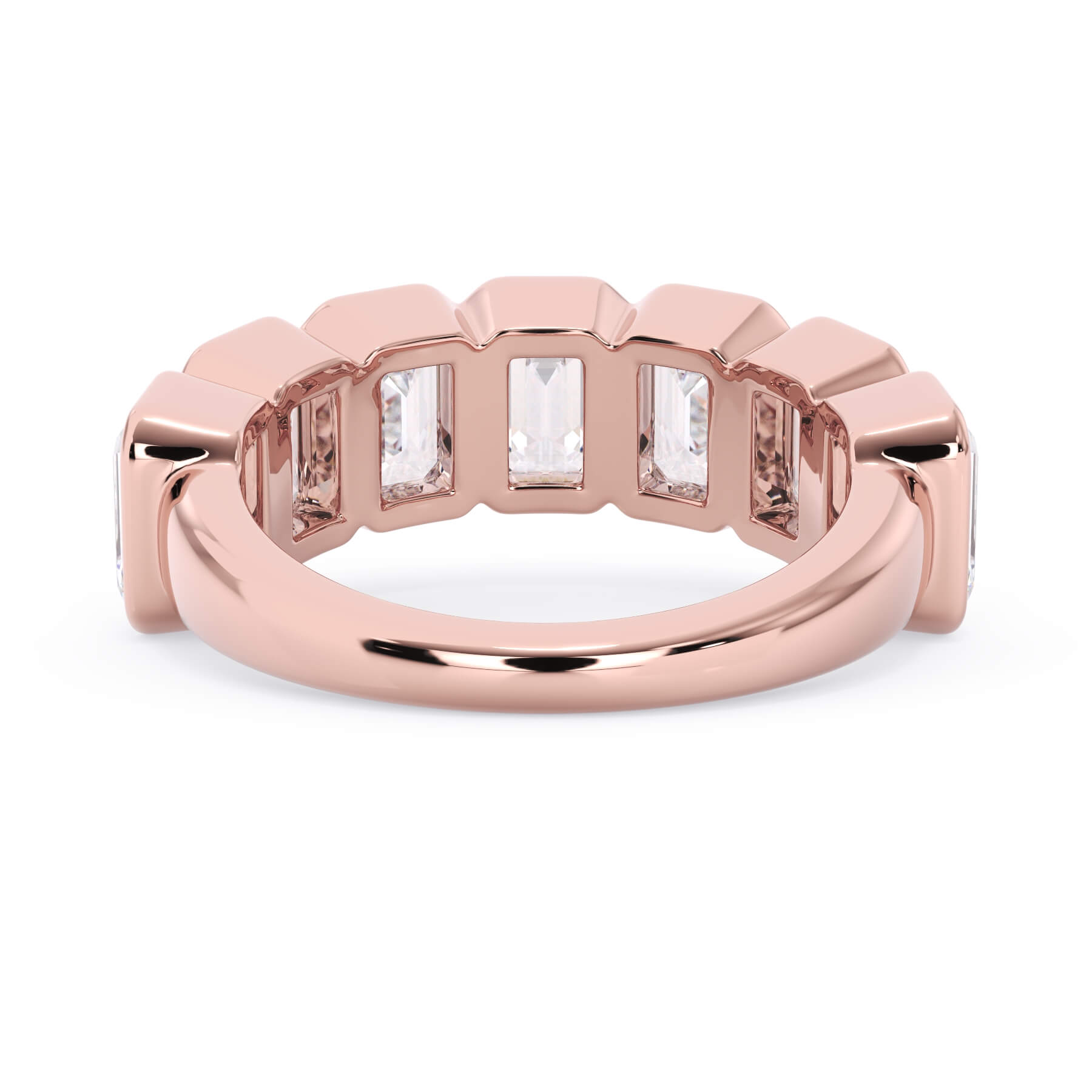 A picture of a seven stone diamond wedding ring with emerald cut diamonds that are bezel set in rose gold on a white background with a view of the underside of the ring.