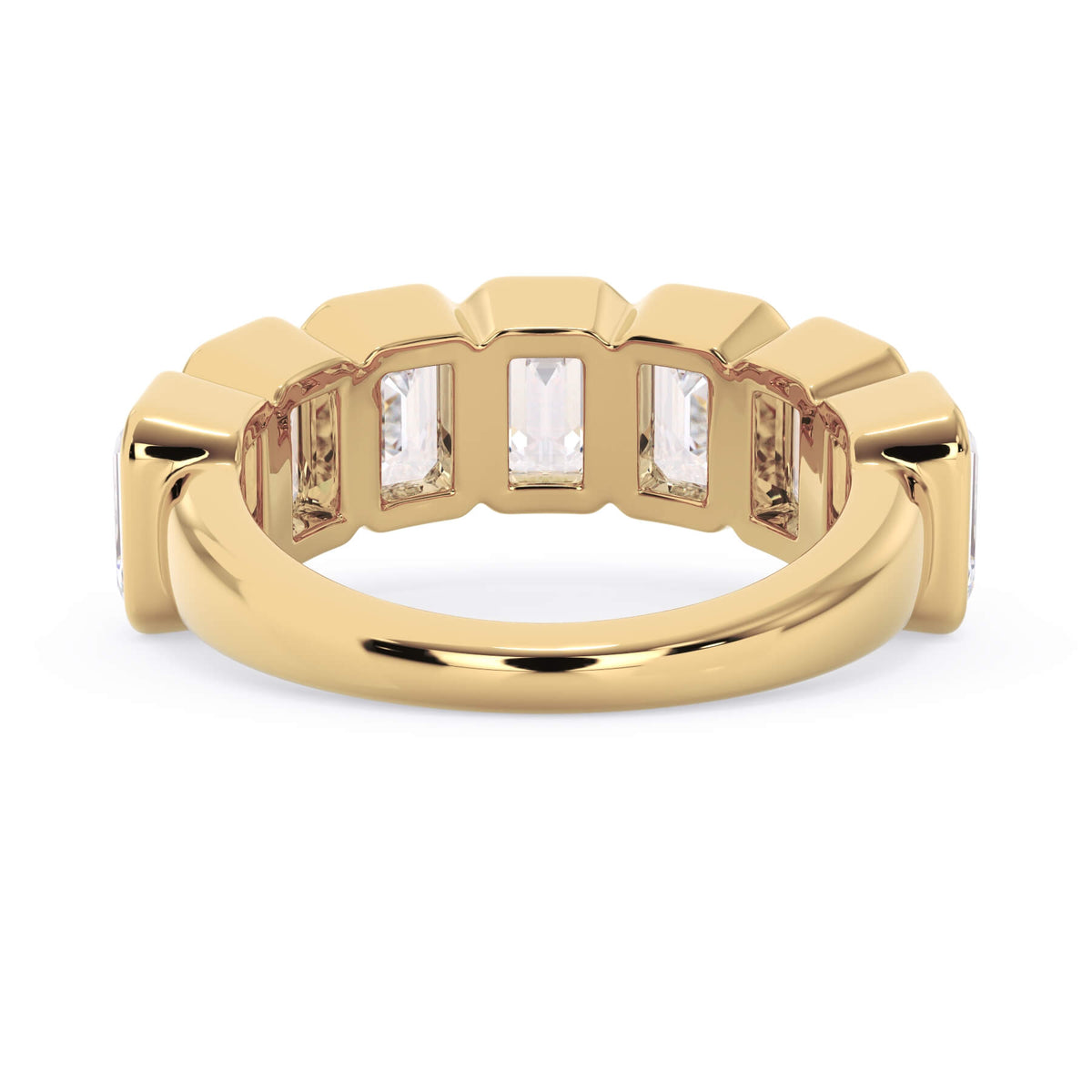 A picture of a seven stone diamond wedding ring with emerald cut diamonds that are bezel set in yellow gold on a white background with a view of the underside of the ring.