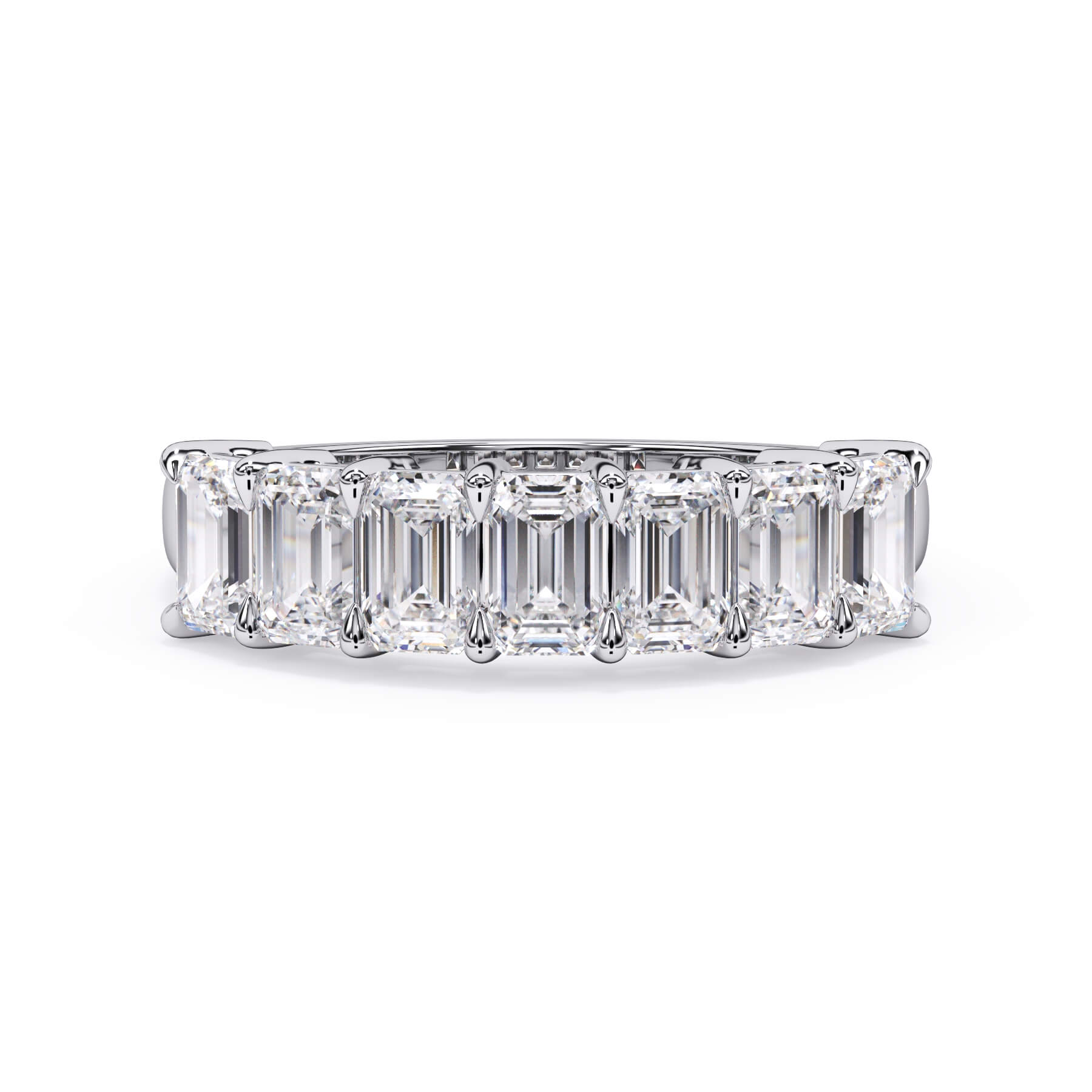 A picture of a seven stone diamond wedding ring with emerald cut diamonds that are shared prong set in white gold or platinum on a white background with the ring facing forward, lying down.