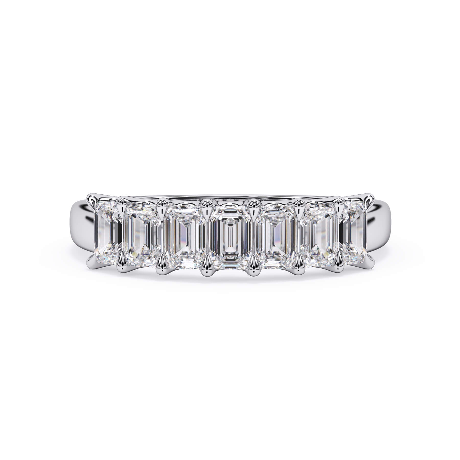 A picture of a seven stone diamond wedding ring with emerald cut diamonds that are U prong set in white gold or platinum on a white background with the ring facing forward, lying down.