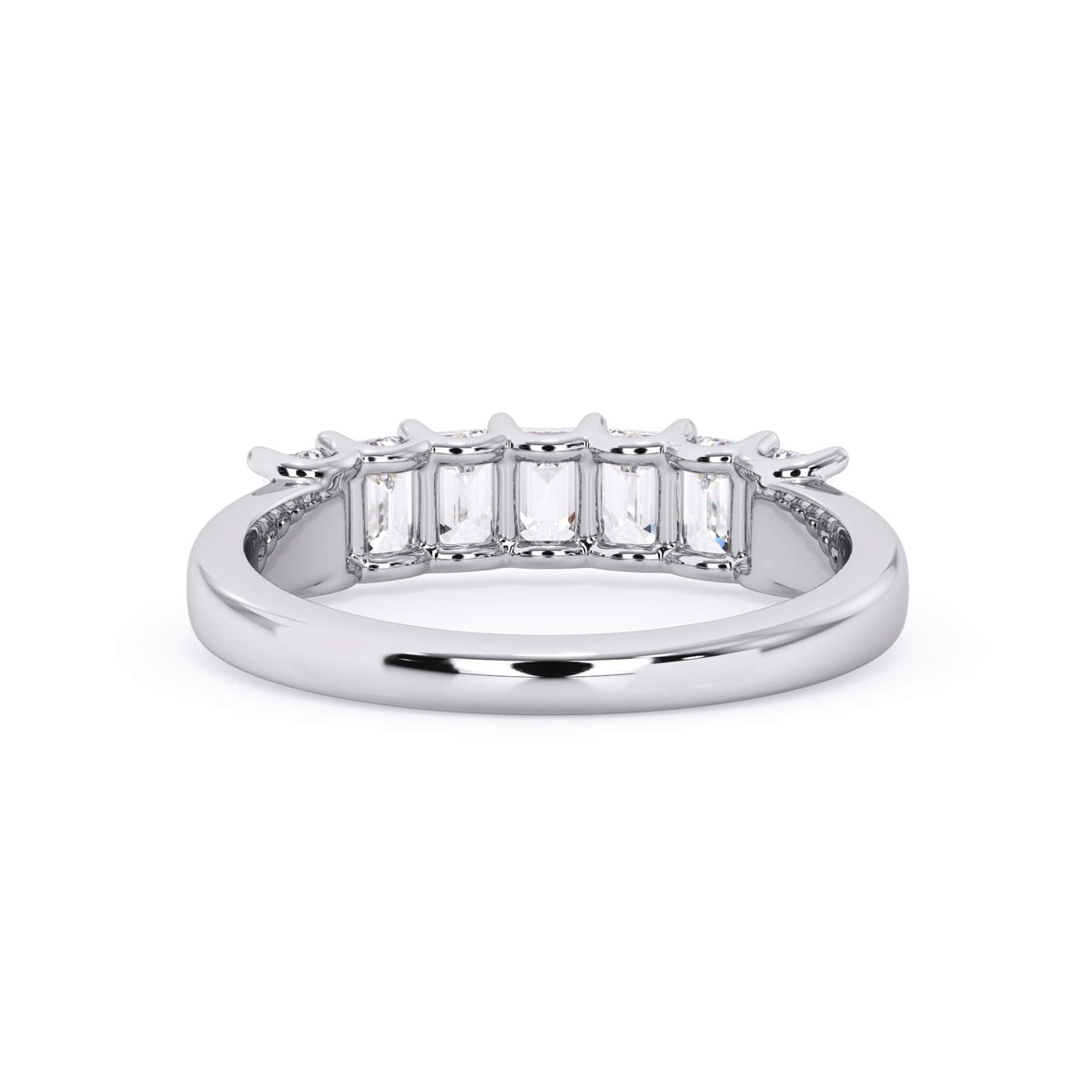 A picture of a seven stone diamond wedding ring with emerald cut diamonds that are U prong set in white gold or platinum on a white background with a view of the underside of the ring.