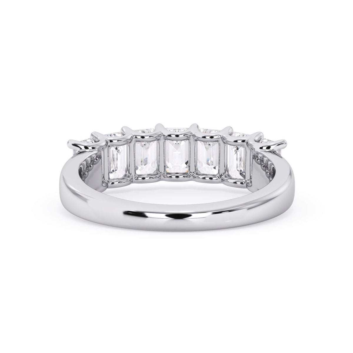 A picture of a seven stone diamond wedding ring with emerald cut diamonds that are U prong set in white gold or platinum on a white background with a view of the underside of the ring.