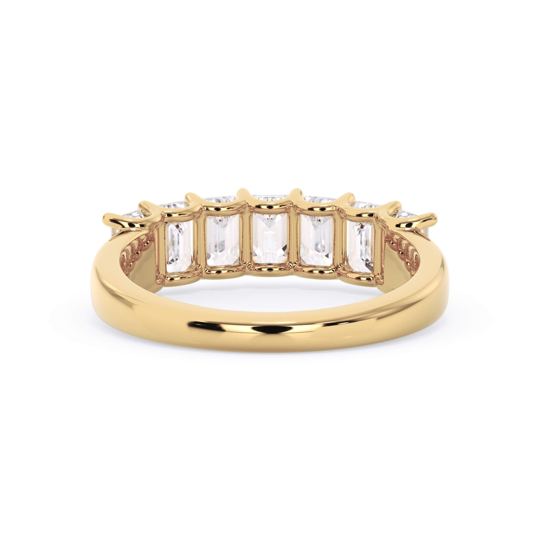 A picture of a seven stone diamond wedding ring with emerald cut diamonds that are U prong set in yellow gold on a white background with a view of the underside of the ring.