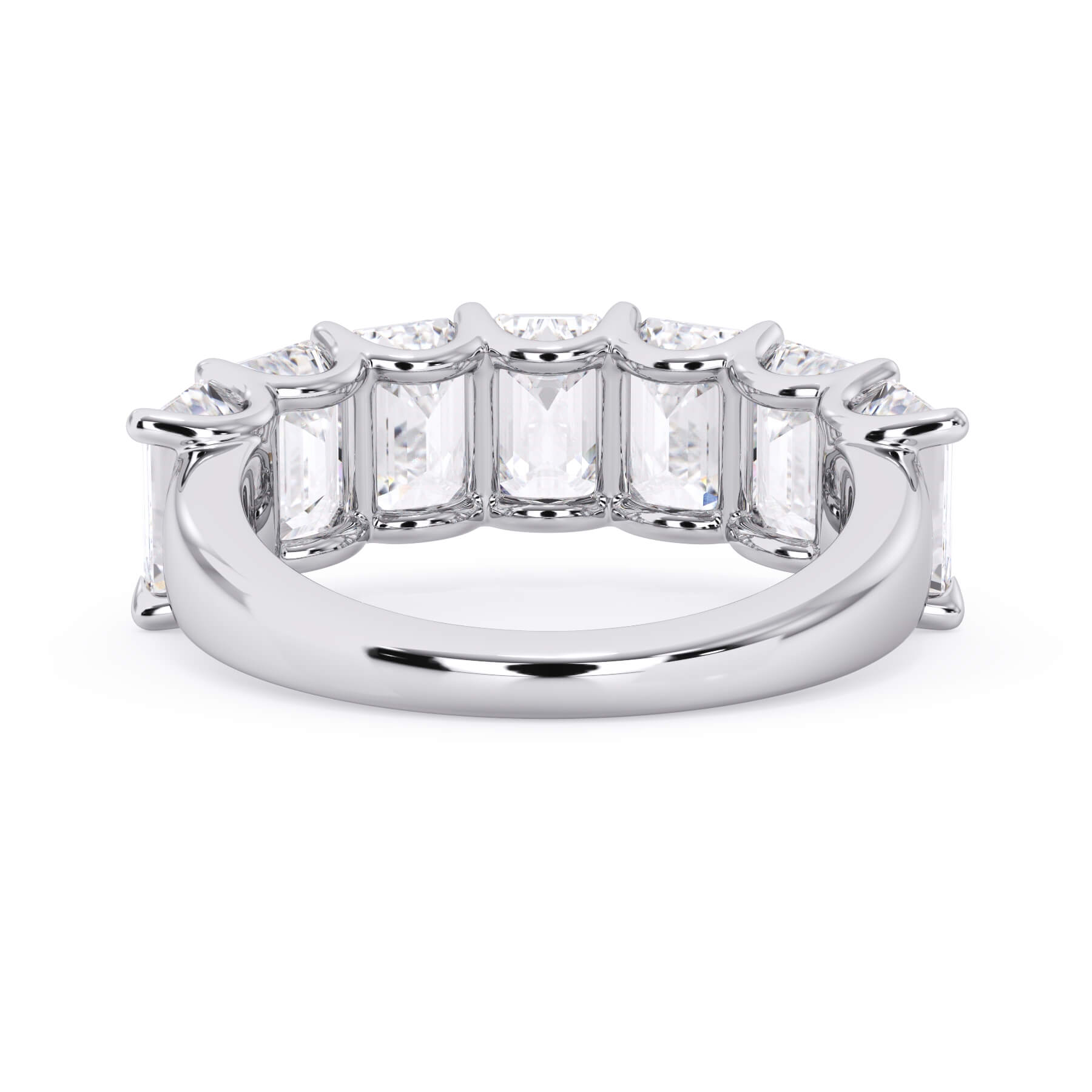 A picture of a seven stone diamond wedding ring with emerald cut diamonds that are U prong set in white gold or platinum on a white background with a view of the underside of the ring.