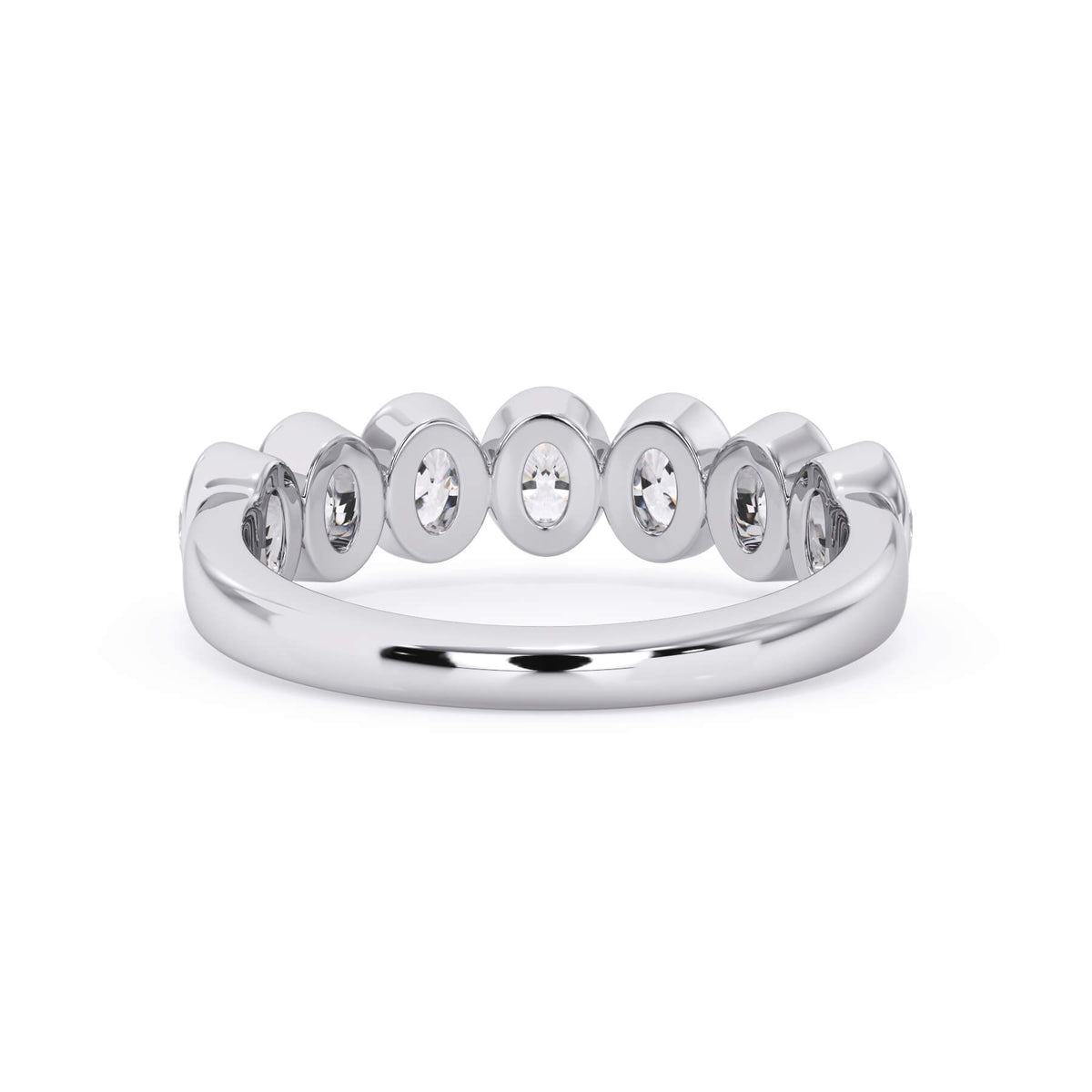 A picture of a seven stone diamond wedding ring with oval shaped diamonds that are bezel set in white gold or platinum on a white background with a view of the underside of the ring.