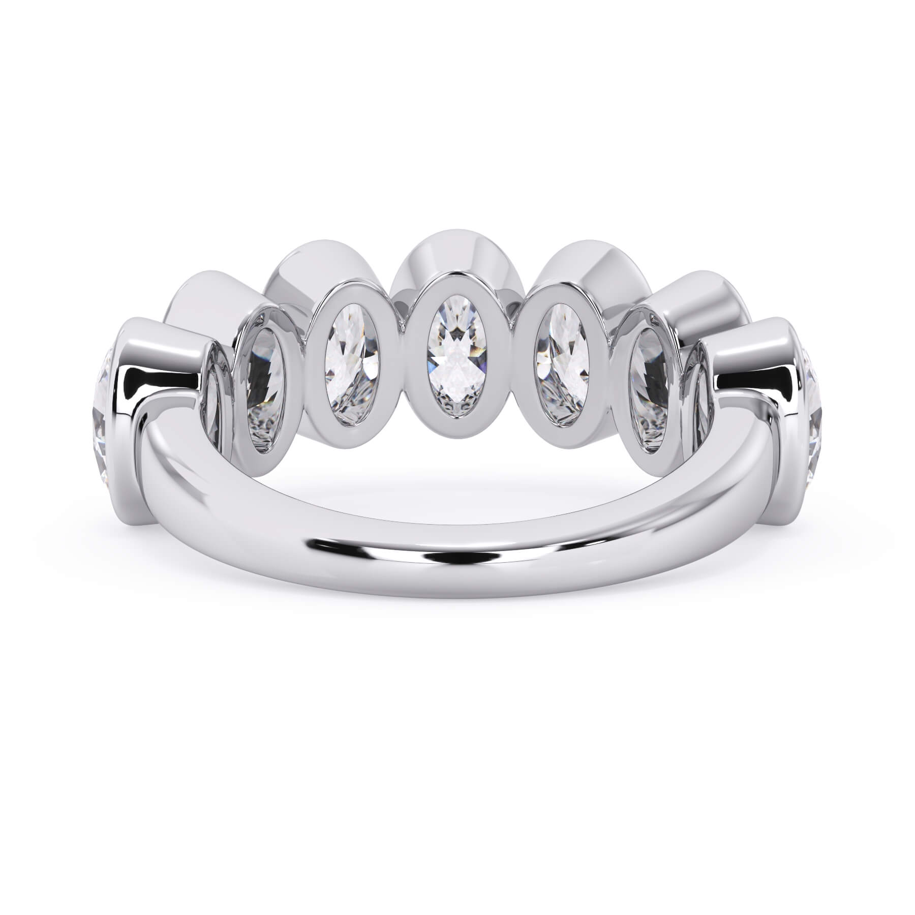 A picture of a seven stone diamond wedding ring with oval shaped diamonds that are bezel set in white gold or platinum on a white background with a view of the underside of the ring.