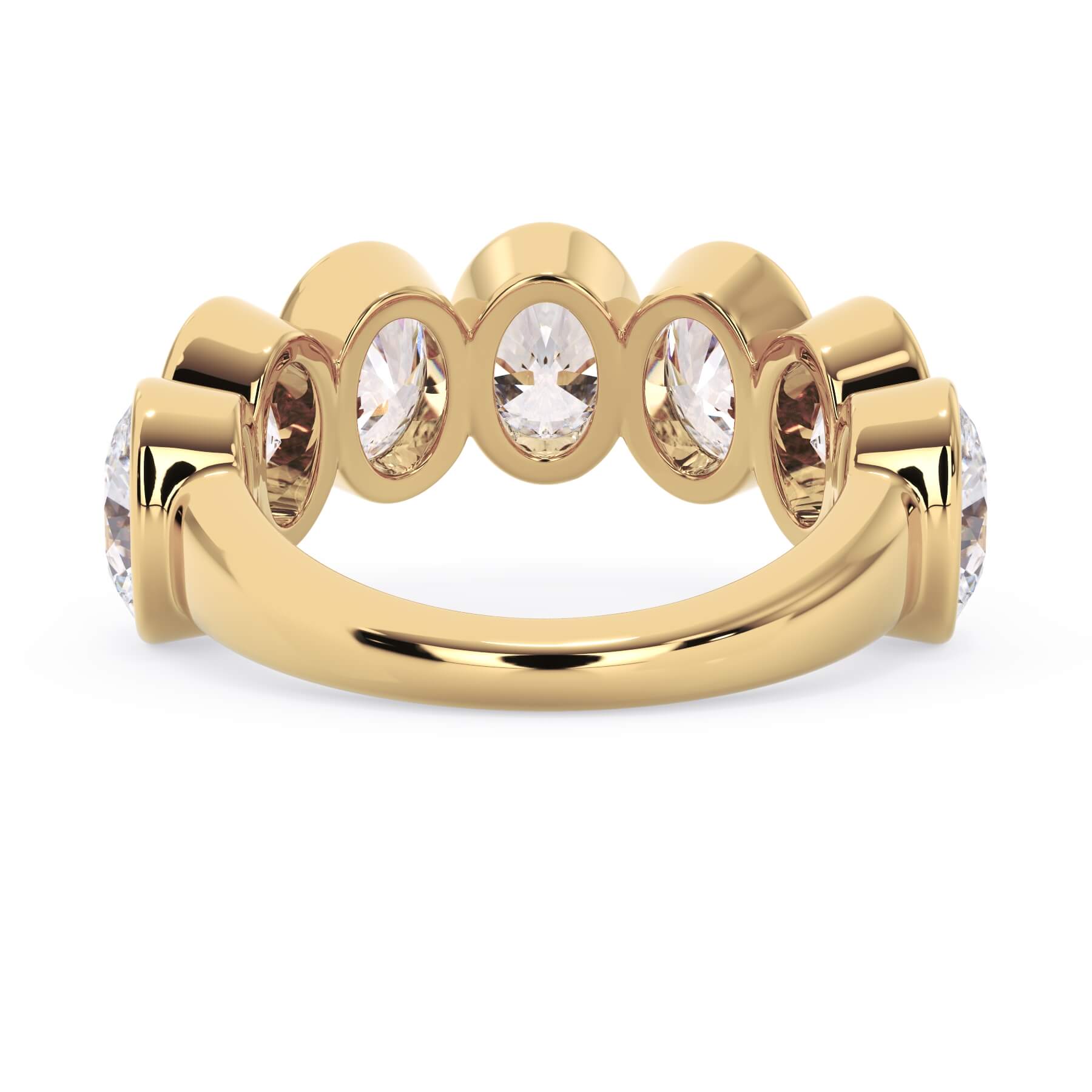 A picture of a seven stone diamond wedding ring with oval shaped diamonds that are bezel set in yellow gold on a white background with a view of the underside of the ring.