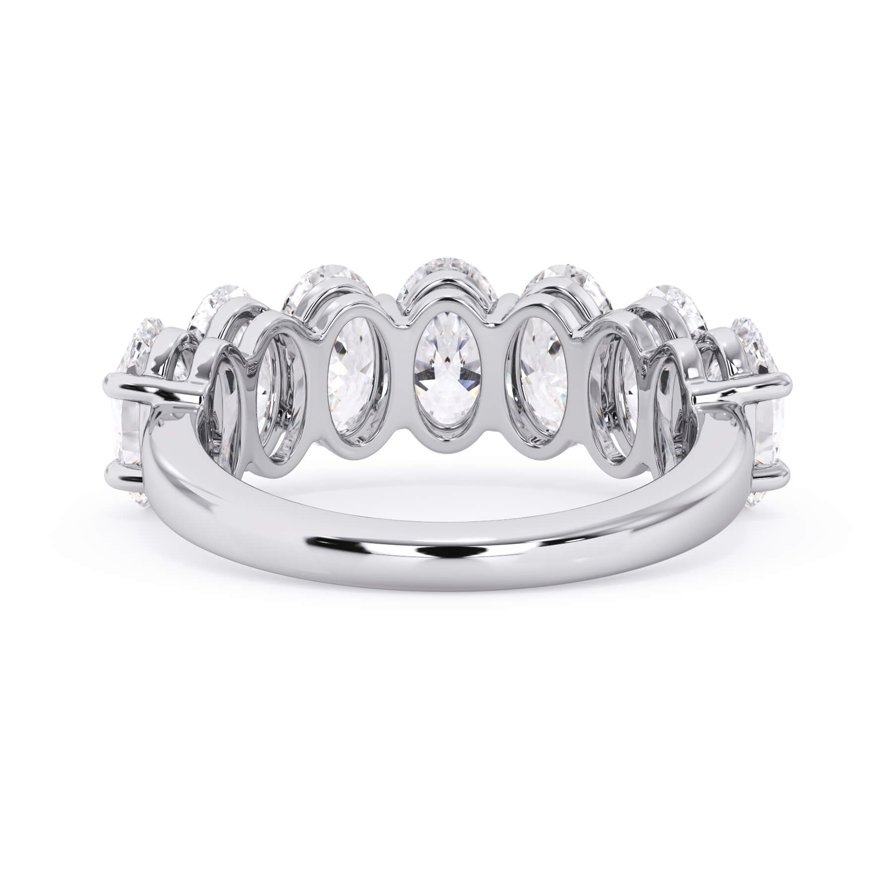 A picture of a seven stone diamond wedding ring with oval shaped diamonds that are shared prong set in white gold or platinum on a white background with a view of the underside of the ring.