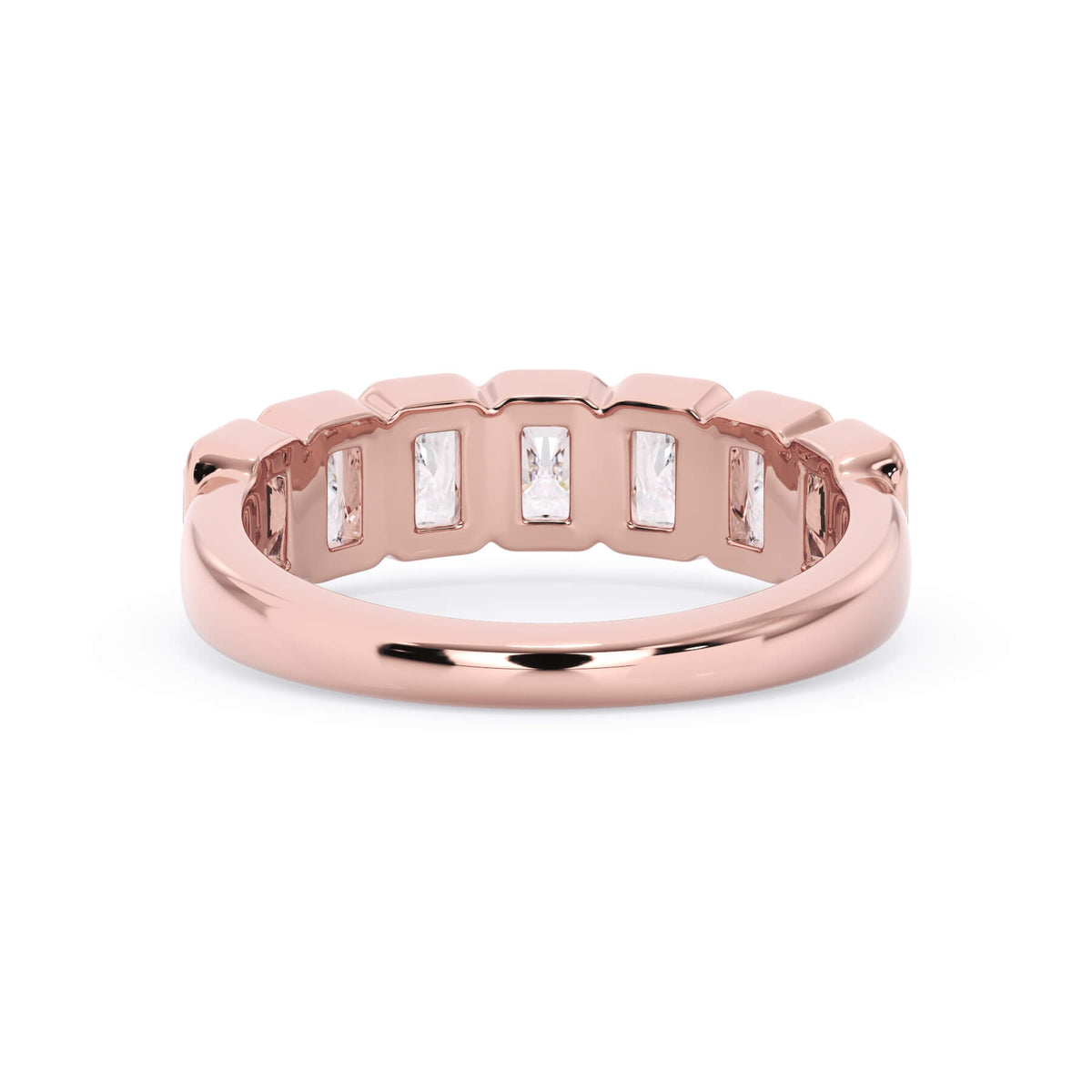 A picture of a seven stone diamond wedding ring with radiant cut diamonds that are bezel set in rose gold on a white background with a view of the underside of the ring.