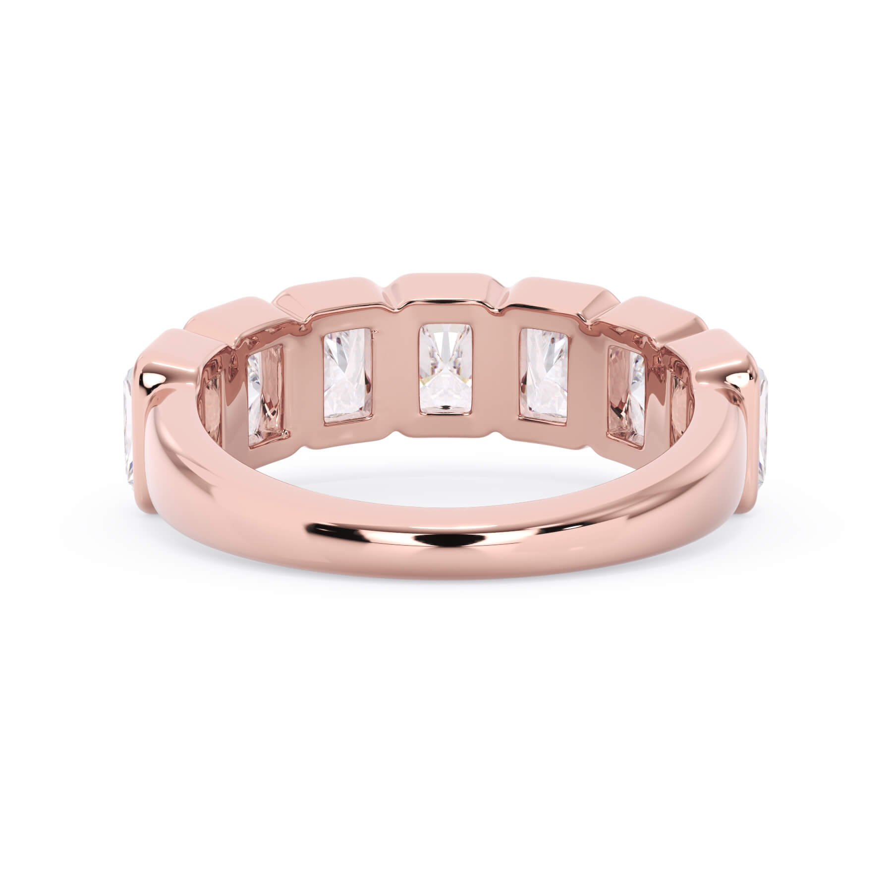 A picture of a seven stone diamond wedding ring with radiant cut diamonds that are bezel set in rose gold on a white background with a view of the underside of the ring.