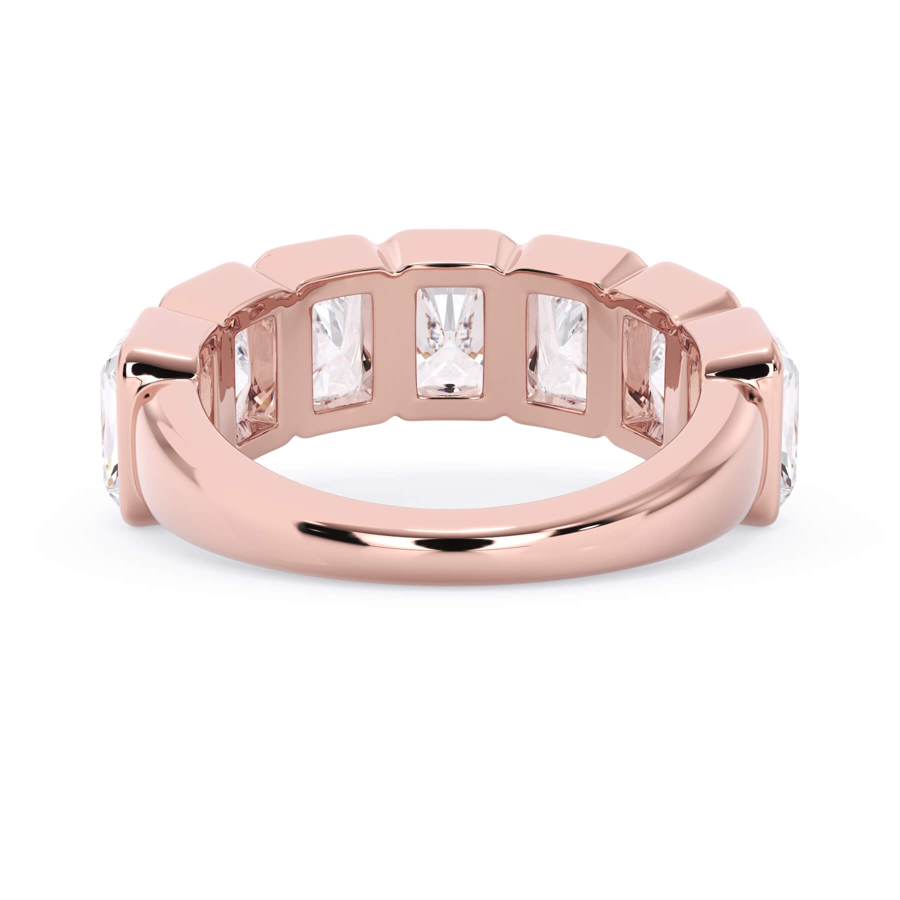 A picture of a seven stone diamond wedding ring with radiant cut diamonds that are bezel set in rose gold on a white background with a view of the underside of the ring.
