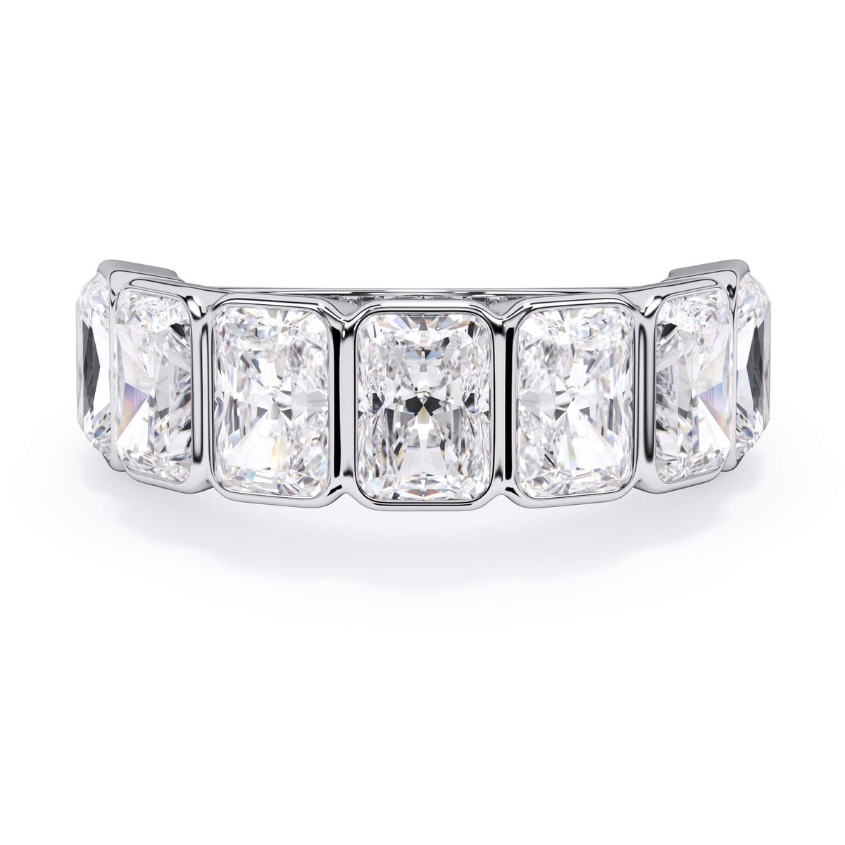 A picture of a seven stone diamond wedding ring with radiant cut diamonds that are bezel set in white gold or platinum on a white background with the ring facing forward, lying down.
