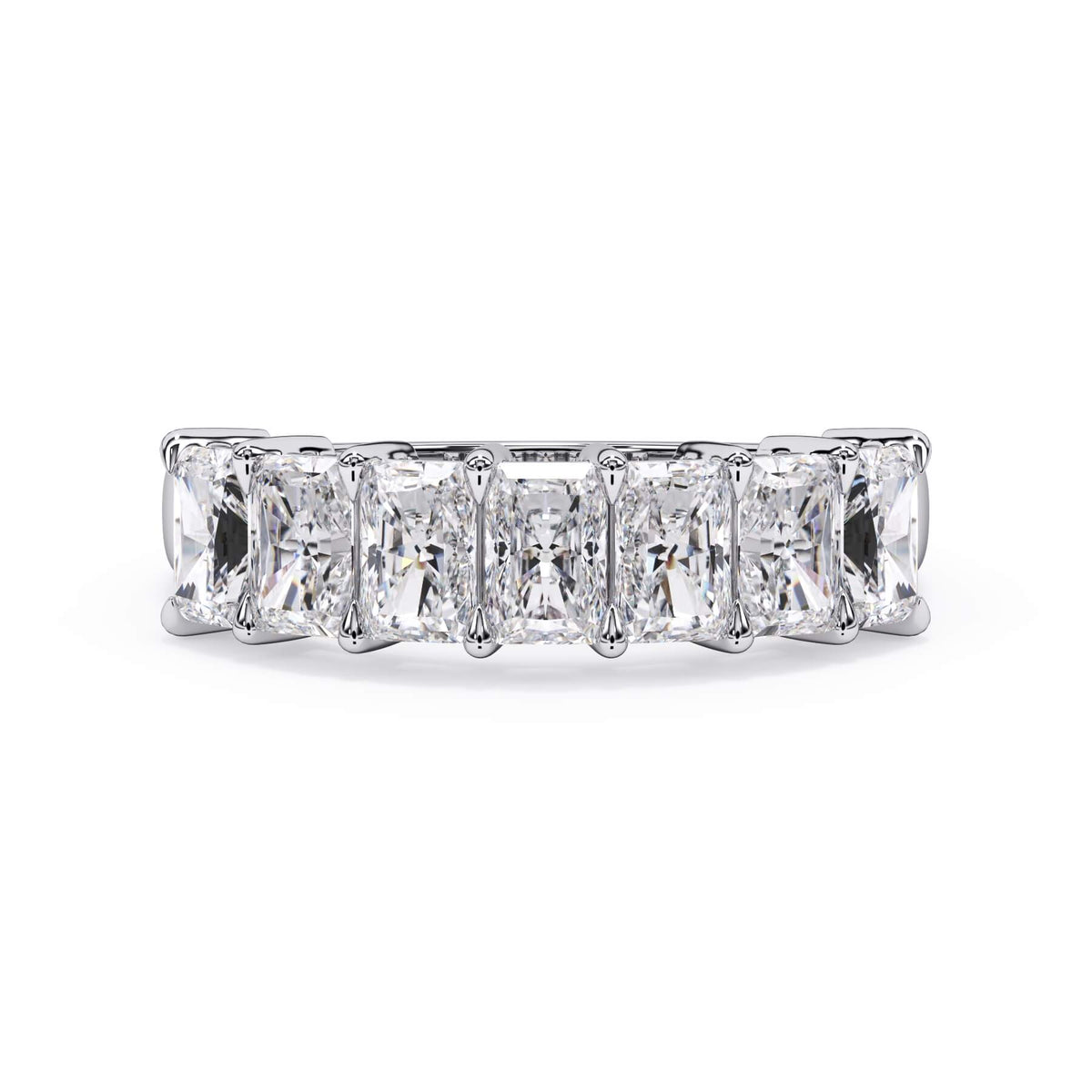 A picture of a seven stone diamond wedding ring with radiant cut diamonds that are shared prong set in white gold or platinum on a white background with the ring facing forward, lying down.
