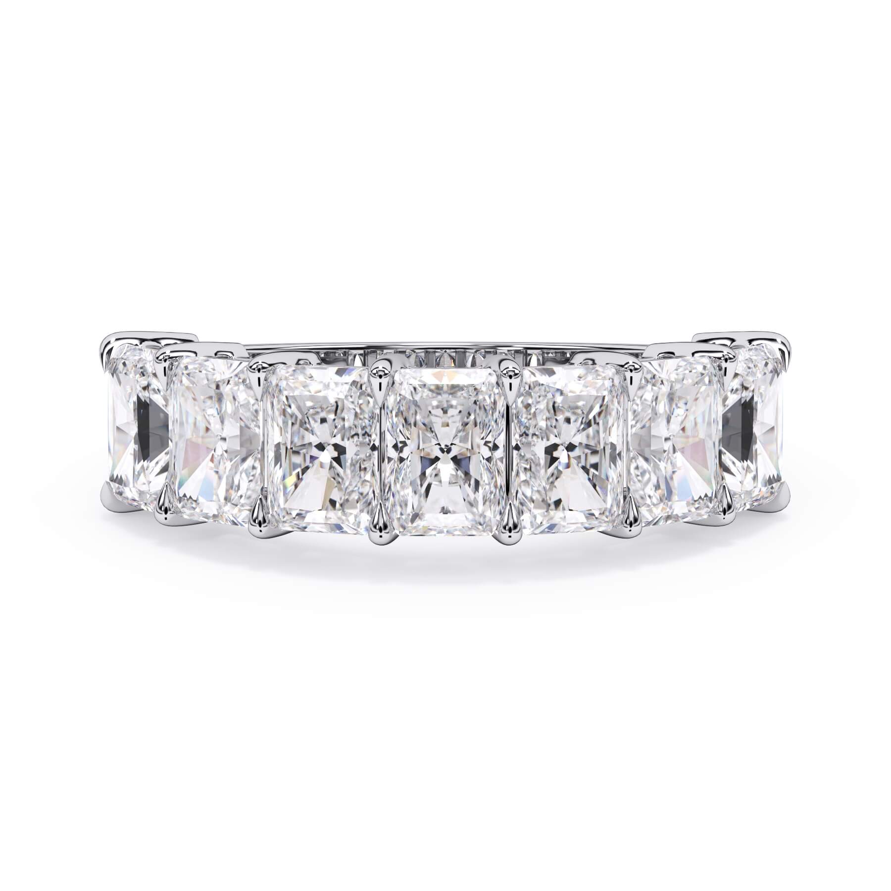 A picture of a seven stone diamond wedding ring with radiant cut diamonds that are shared prong set in white gold or platinum on a white background with the ring facing forward, lying down.