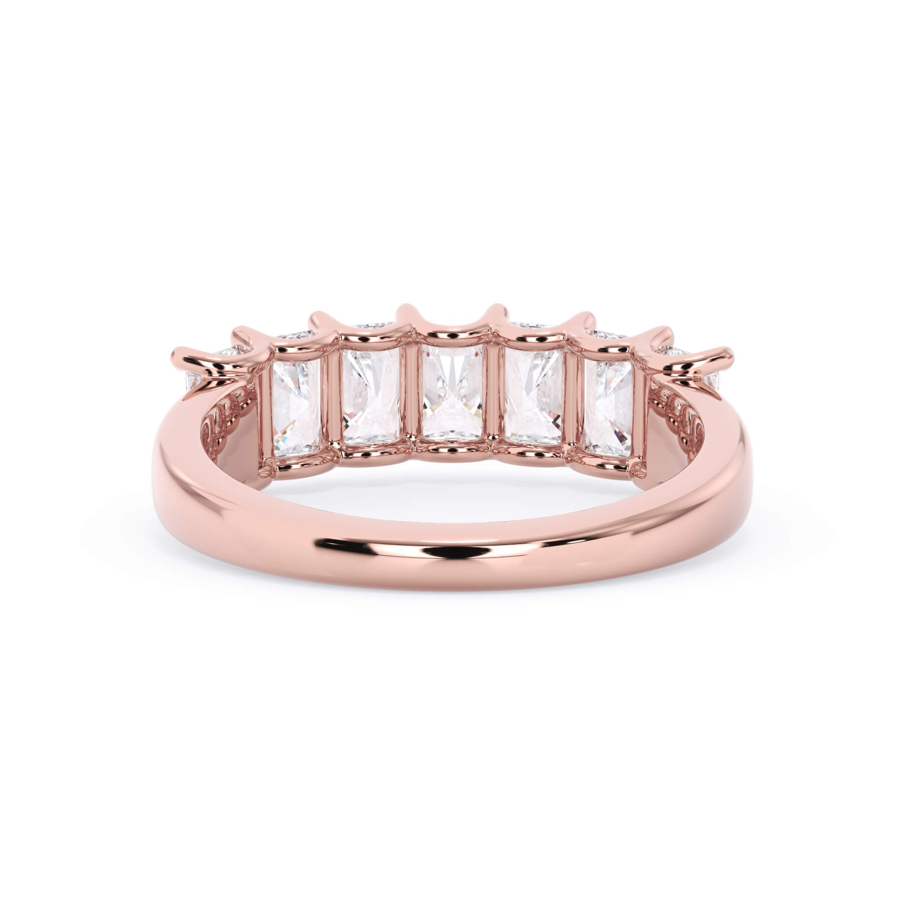 A picture of a seven stone diamond wedding ring with radiant cut diamonds that are U prong set in rose gold on a white background with a view of the underside of the ring.
