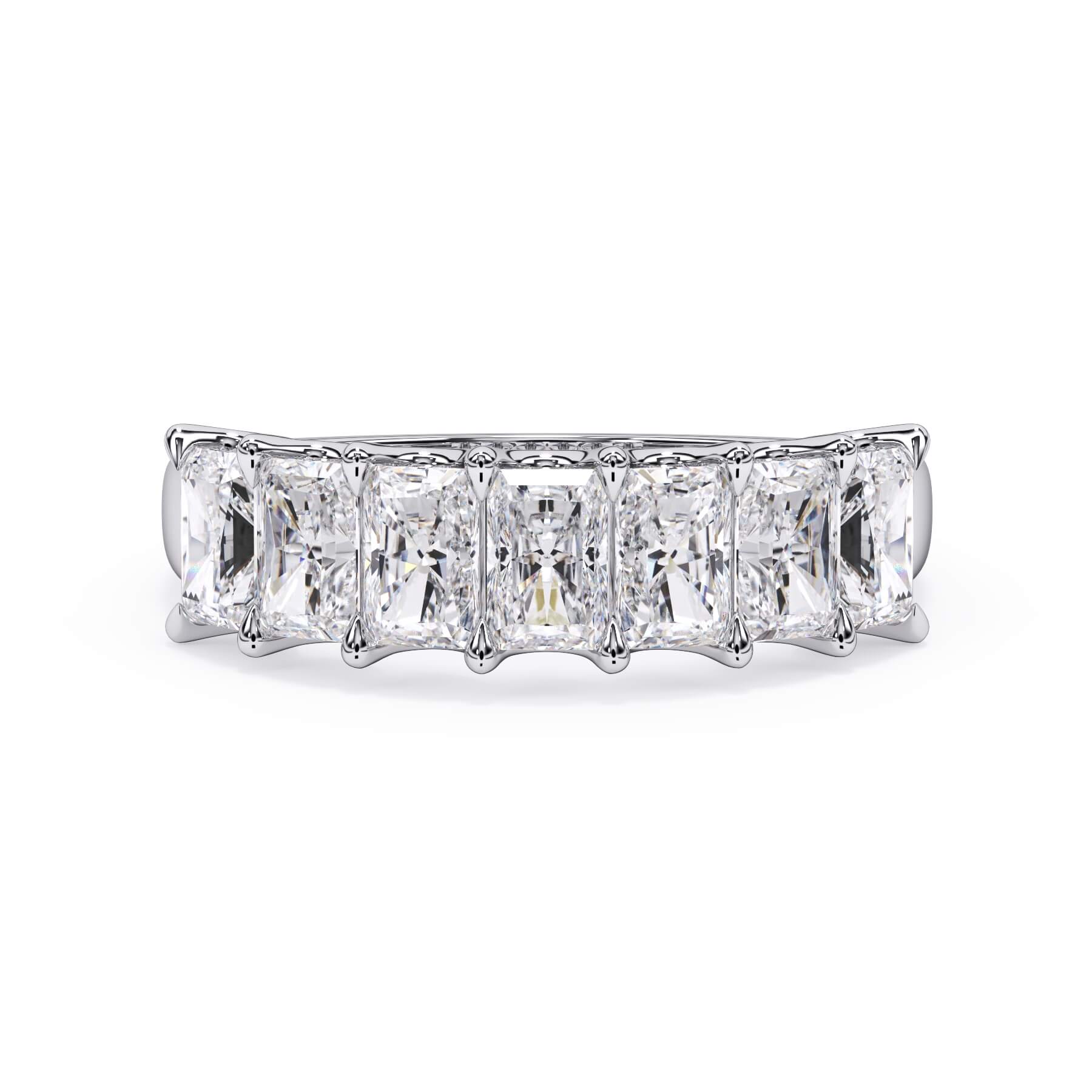 A picture of a seven stone diamond wedding ring with radiant cut diamonds that are U prong set in white gold or platinum on a white background with the ring facing forward, lying down.