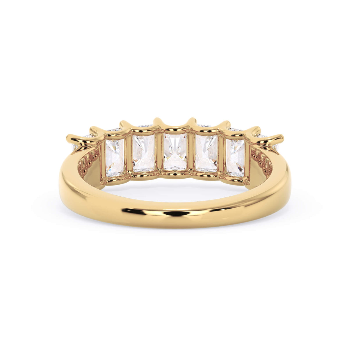 A picture of a seven stone diamond wedding ring with radiant cut diamonds that are U prong set in yellow gold on a white background with a view of the underside of the ring.