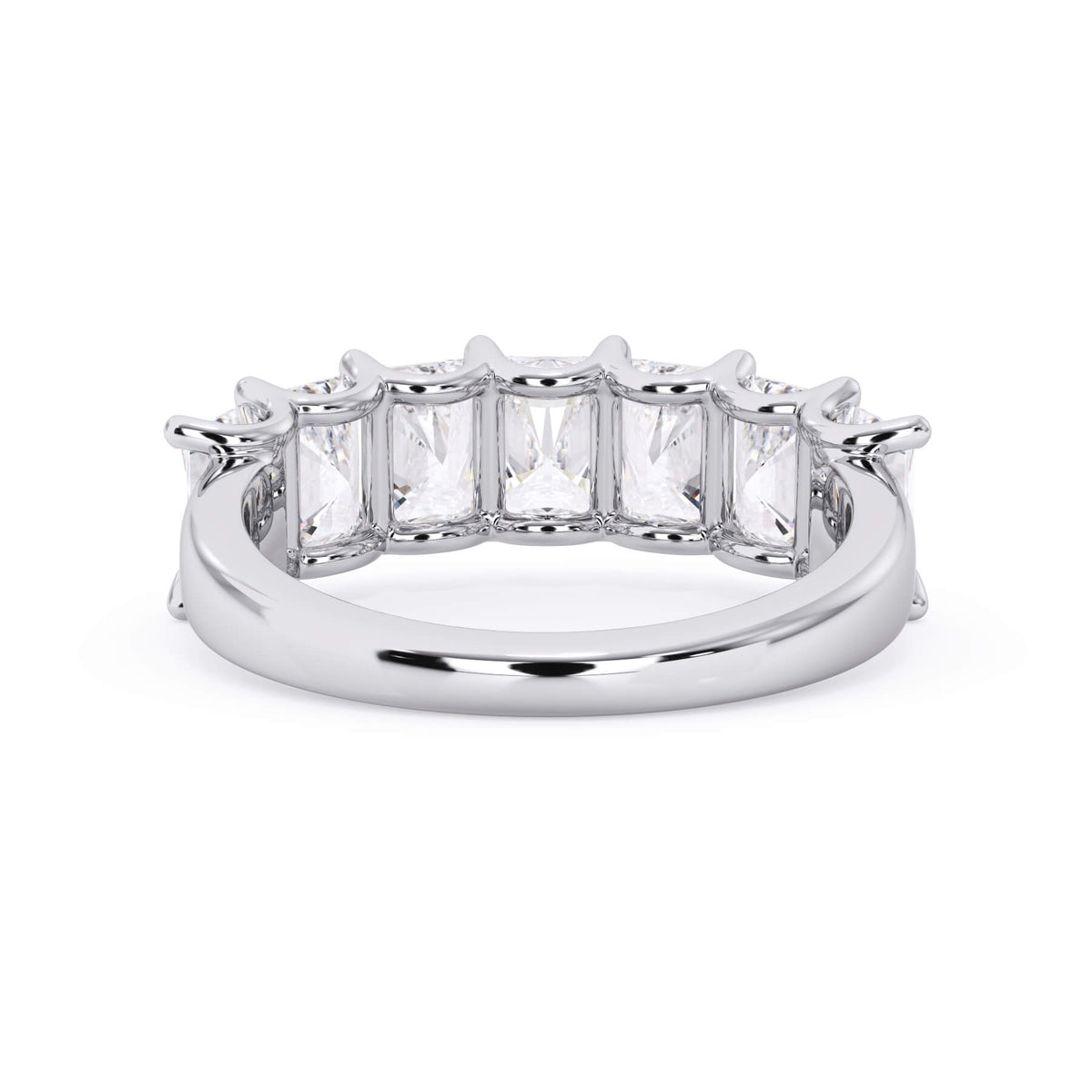 A picture of a seven stone diamond wedding ring with radiant cut diamonds that are U prong set in white gold or platinum on a white background with a view of the underside of the ring.