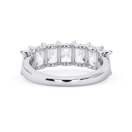 A picture of a seven stone diamond wedding ring with radiant cut diamonds that are U prong set in white gold or platinum on a white background with a view of the underside of the ring.