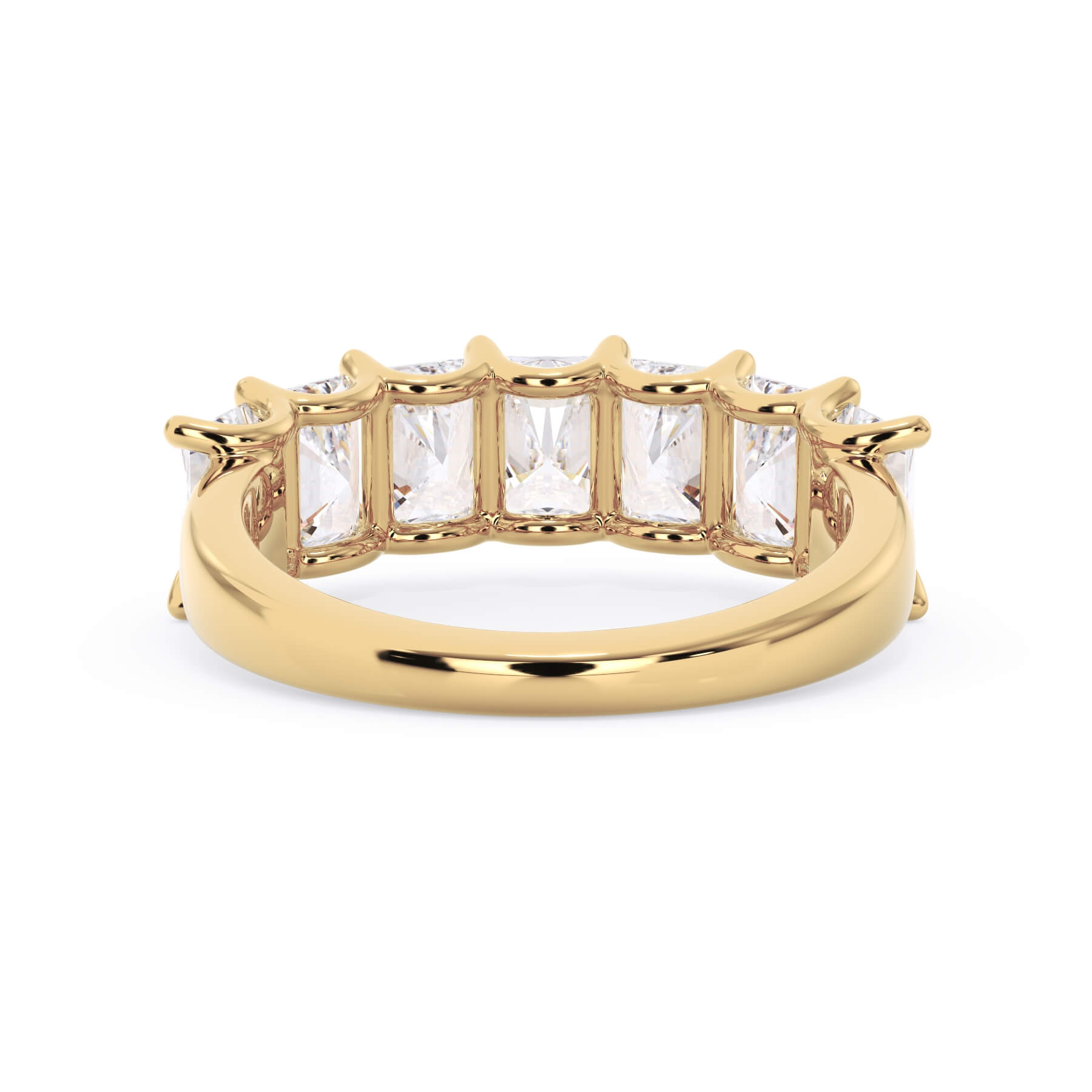 A picture of a seven stone diamond wedding ring with radiant cut diamonds that are U prong set in yellow gold on a white background with a view of the underside of the ring.