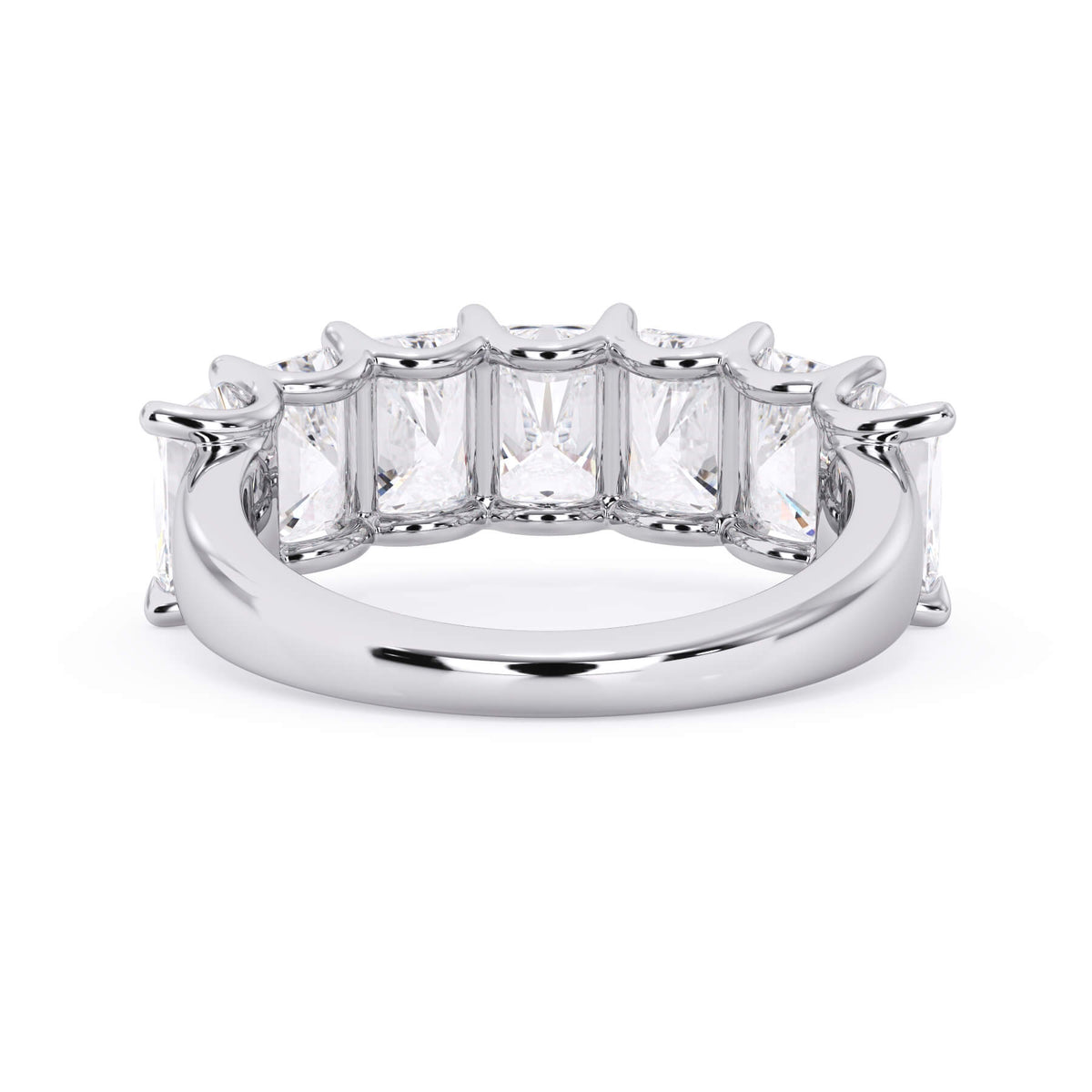 A picture of a seven stone diamond wedding ring with radiant cut diamonds that are U prong set in white gold or platinum on a white background with the ring facing forward, lying down.
